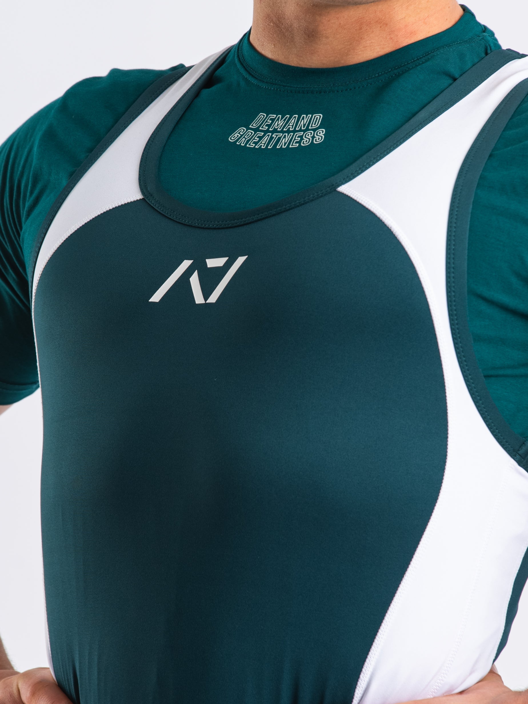 A7 IPF Approved Emerald Forás Luno singlet features extra lat mobility, side panel stitching to guide the squat depth level and curved panel design for a slimming look. The Women's cut singlet features a tapered waist and additional quad room. The IPF Approved Kit includes Luno Powerlifting Singlet, A7 Meet Shirt, A7 Zebra Wrist Wraps, A7 Deadlift Socks, Hourglass Knee Sleeves (Stiff Knee Sleeves and Rigor Mortis Knee Sleeves). All A7 Powerlifting Equipment shipping to UK, Norway, Switzerland and Iceland.