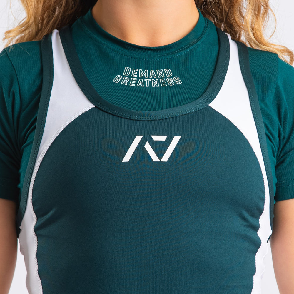 
                      
                        A7 IPF Approved Emerald Forás Luno singlet features extra lat mobility, side panel stitching to guide the squat depth level and curved panel design for a slimming look. The Women's cut singlet features a tapered waist and additional quad room. The IPF Approved Kit includes Luno Powerlifting Singlet, A7 Meet Shirt, A7 Zebra Wrist Wraps, A7 Deadlift Socks, Hourglass Knee Sleeves (Stiff Knee Sleeves and Rigor Mortis Knee Sleeves). All A7 Powerlifting Equipment shipping to UK, Norway, Switzerland and Iceland.
                      
                    