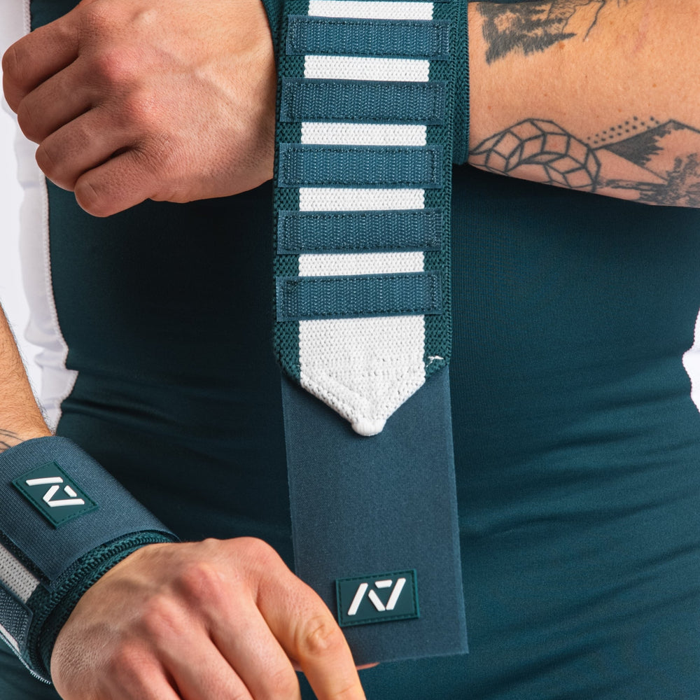 
                      
                        A7 IPF Approved Zebra Wraps feature strips of velcro on the wraps, allowing Zebra Wraps to conform fully to your unique preference of tightness. We offer Zebra wrist wraps in 3 lengths and 4 stiffnesses (Flexi, Mids, Stiff, and Rigor Mortis). The IPF Approved Kit includes Powerlifting Singlet, A7 Meet Shirt, A7 Zebra Wrist Wraps, A7 Deadlift Socks, Hourglass Knee Sleeves (Stiff Knee Sleeves and Rigor Mortis Knee Sleeves). All A7 Powerlifting Equipment shipping to UK, Norway, Switzerland and Iceland.
                      
                    