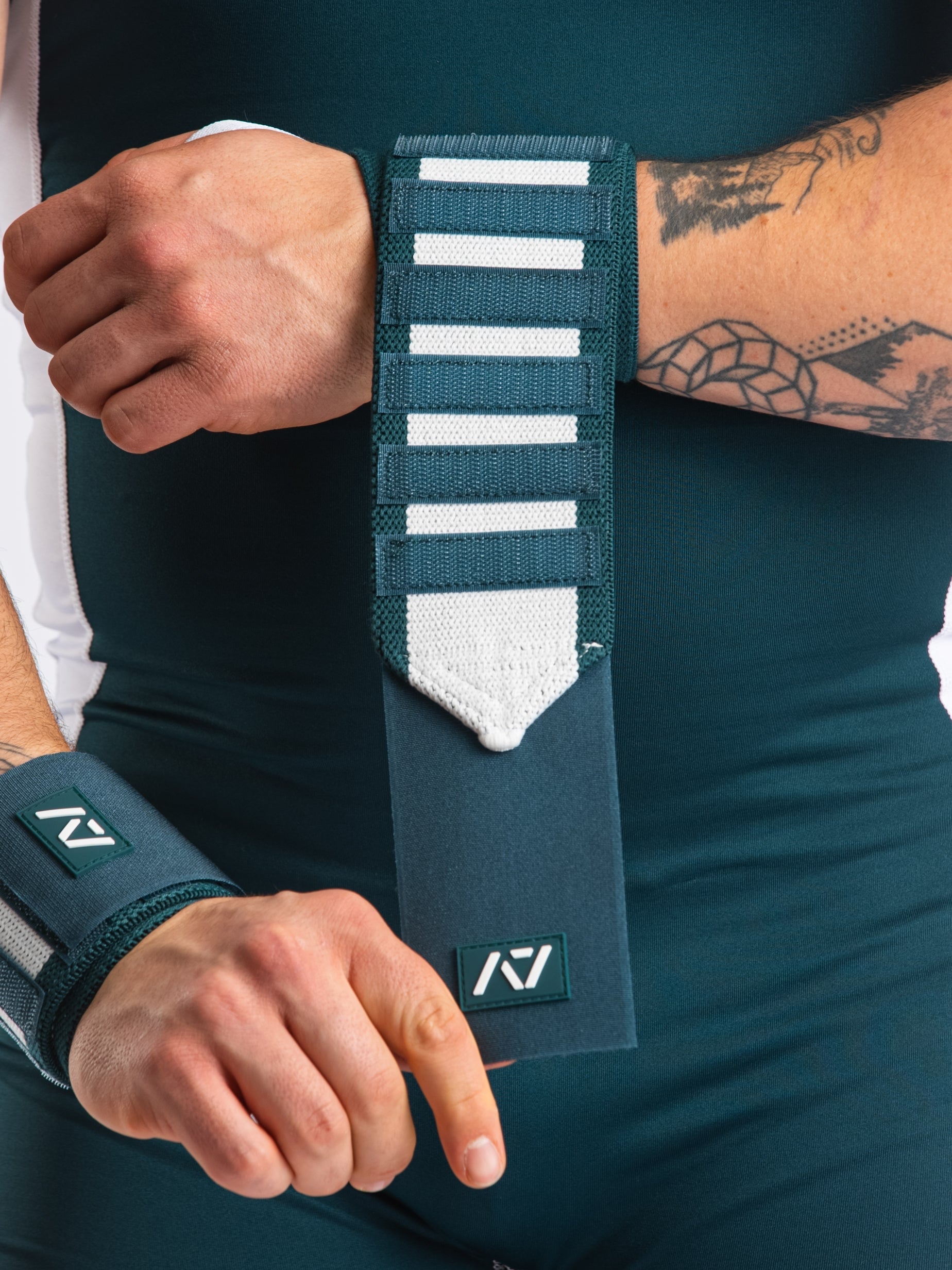 A7 IPF Approved Zebra Wraps feature strips of velcro on the wraps, allowing Zebra Wraps to conform fully to your unique preference of tightness. We offer Zebra wrist wraps in 3 lengths and 4 stiffnesses (Flexi, Mids, Stiff, and Rigor Mortis). The IPF Approved Kit includes Powerlifting Singlet, A7 Meet Shirt, A7 Zebra Wrist Wraps, A7 Deadlift Socks, Hourglass Knee Sleeves (Stiff Knee Sleeves and Rigor Mortis Knee Sleeves). All A7 Powerlifting Equipment shipping to UK, Norway, Switzerland and Iceland.