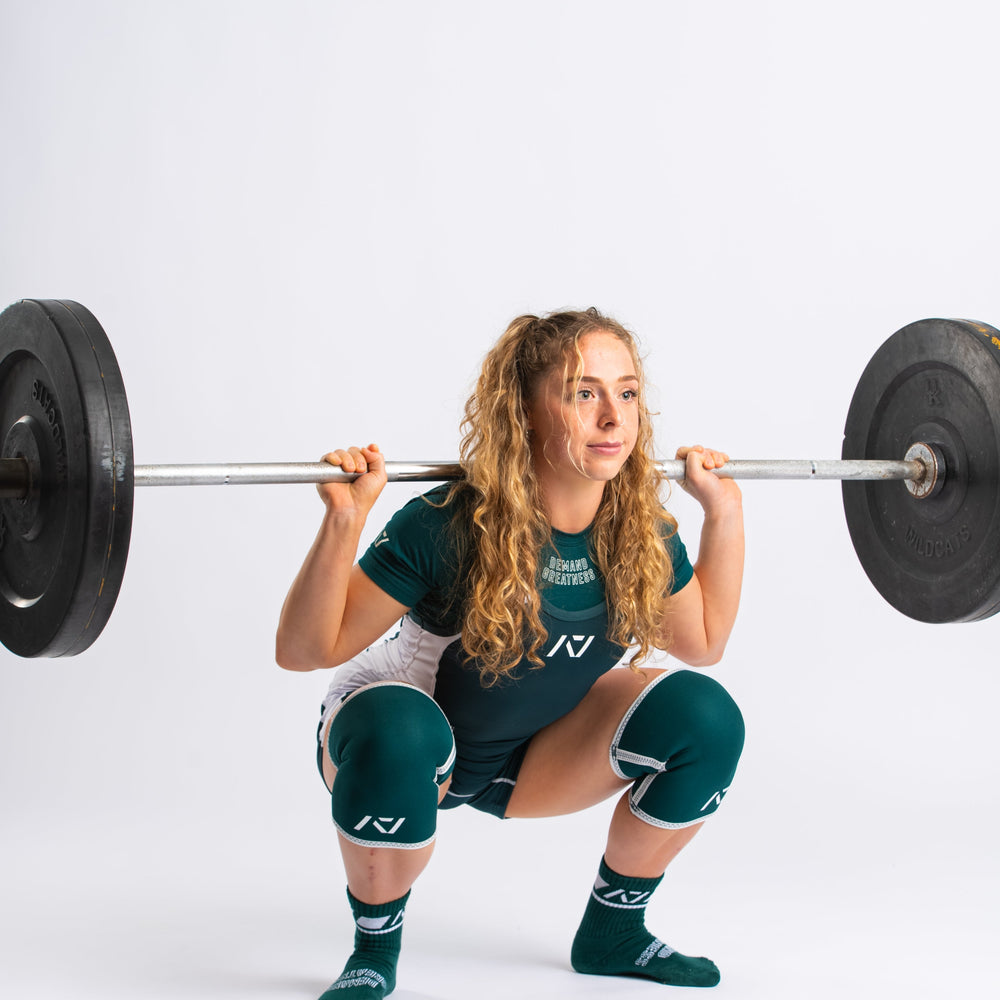 
                      
                        A7 IPF Approved Emerald Forás Luno singlet features extra lat mobility, side panel stitching to guide the squat depth level and curved panel design for a slimming look. The Women's cut singlet features a tapered waist and additional quad room. The IPF Approved Kit includes Luno Powerlifting Singlet, A7 Meet Shirt, A7 Zebra Wrist Wraps, A7 Deadlift Socks, Hourglass Knee Sleeves (Stiff Knee Sleeves and Rigor Mortis Knee Sleeves). All A7 Powerlifting Equipment shipping to UK, Norway, Switzerland and Iceland.
                      
                    