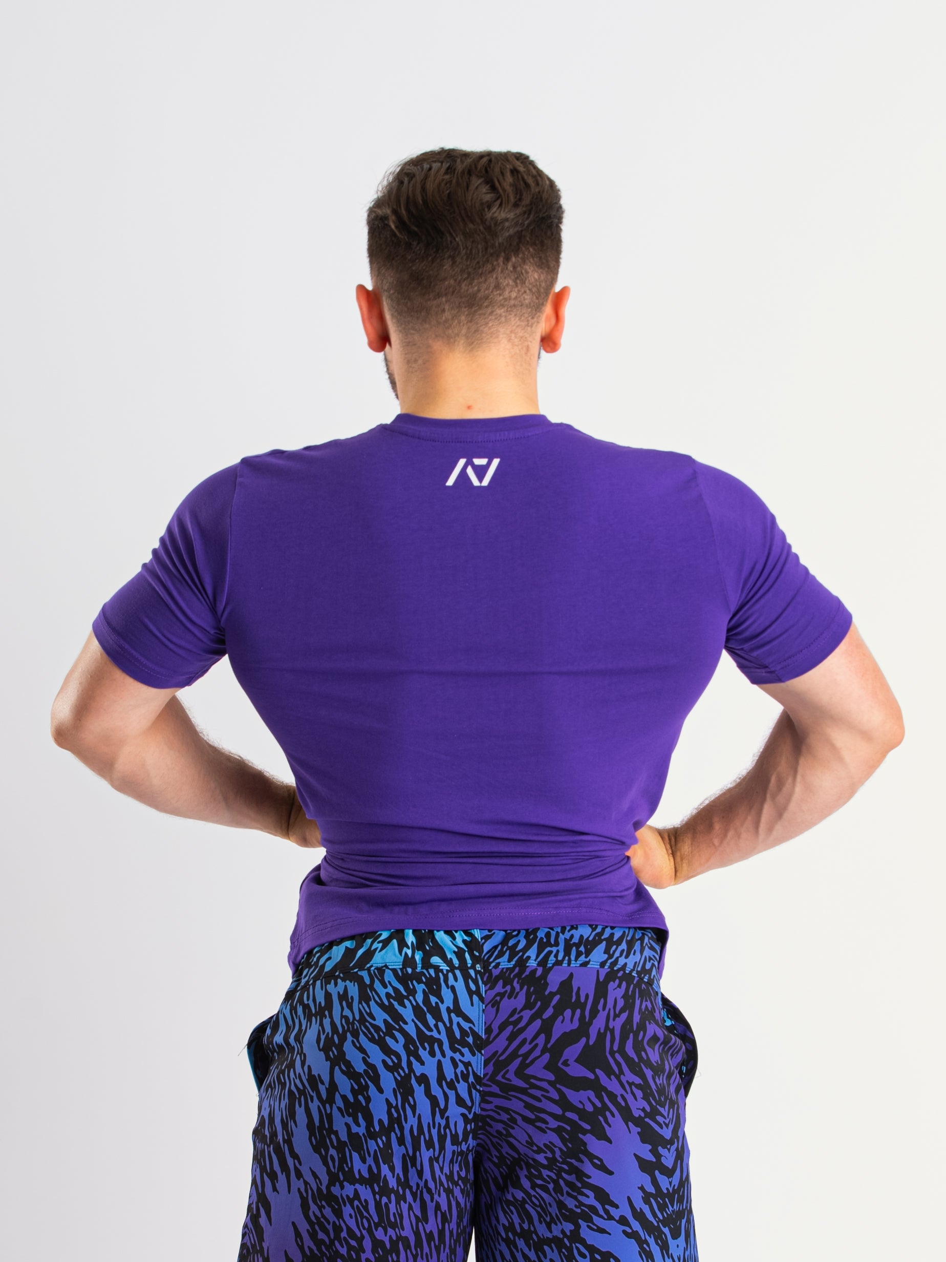 DG23 Purple is our new meet shirt design highlighting Demand Greatness with a double outline font to showcase your impact on the platform. The DG23 Meet Shirt is IPF Approved. Shop the full A7 Powerlifting IPF Approved Equipment collection. The IPF Approved Kit includes Powerlifting Singlet, A7 Meet Shirt, A7 Zebra Wrist Wraps, A7 Deadlift Socks, Hourglass Knee Sleeves (Stiff Knee Sleeves and Rigor Mortis Knee Sleeves). All A7 Powerlifting Equipment shipping to UK, Norway, Switzerland and Iceland.