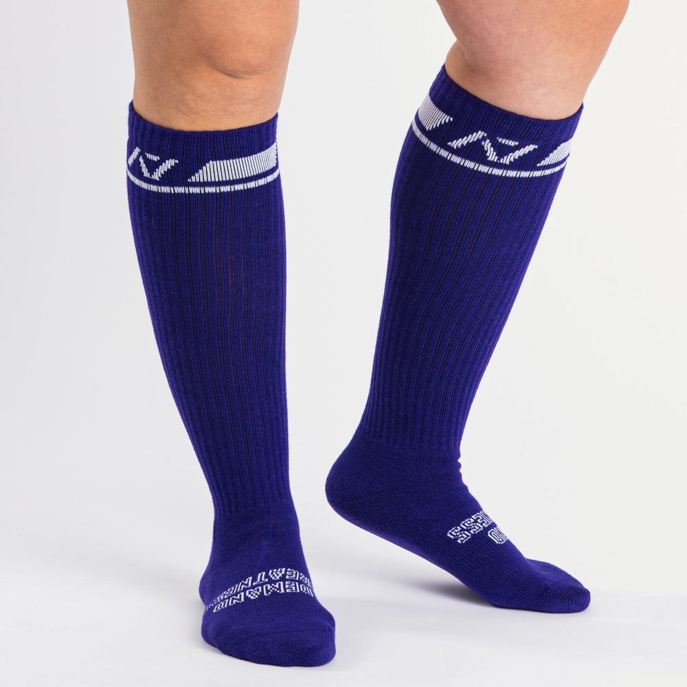 A7 Purple deadlift socks are designed specifically for pulls and keep your shins protected from scrapes. A7 deadlift socks are a perfect pair to wear in training or powerlifting competition. The A7 IPF Approved Kit includes Powerlifting Singlet, A7 Meet Shirt, A7 Zebra Wrist Wraps, A7 Deadlift Socks, Hourglass Knee Sleeves (Stiff Knee Sleeves and Rigor Mortis Knee Sleeves). All A7 Powerlifting Equipment shipping to UK, Norway, Switzerland and Iceland.