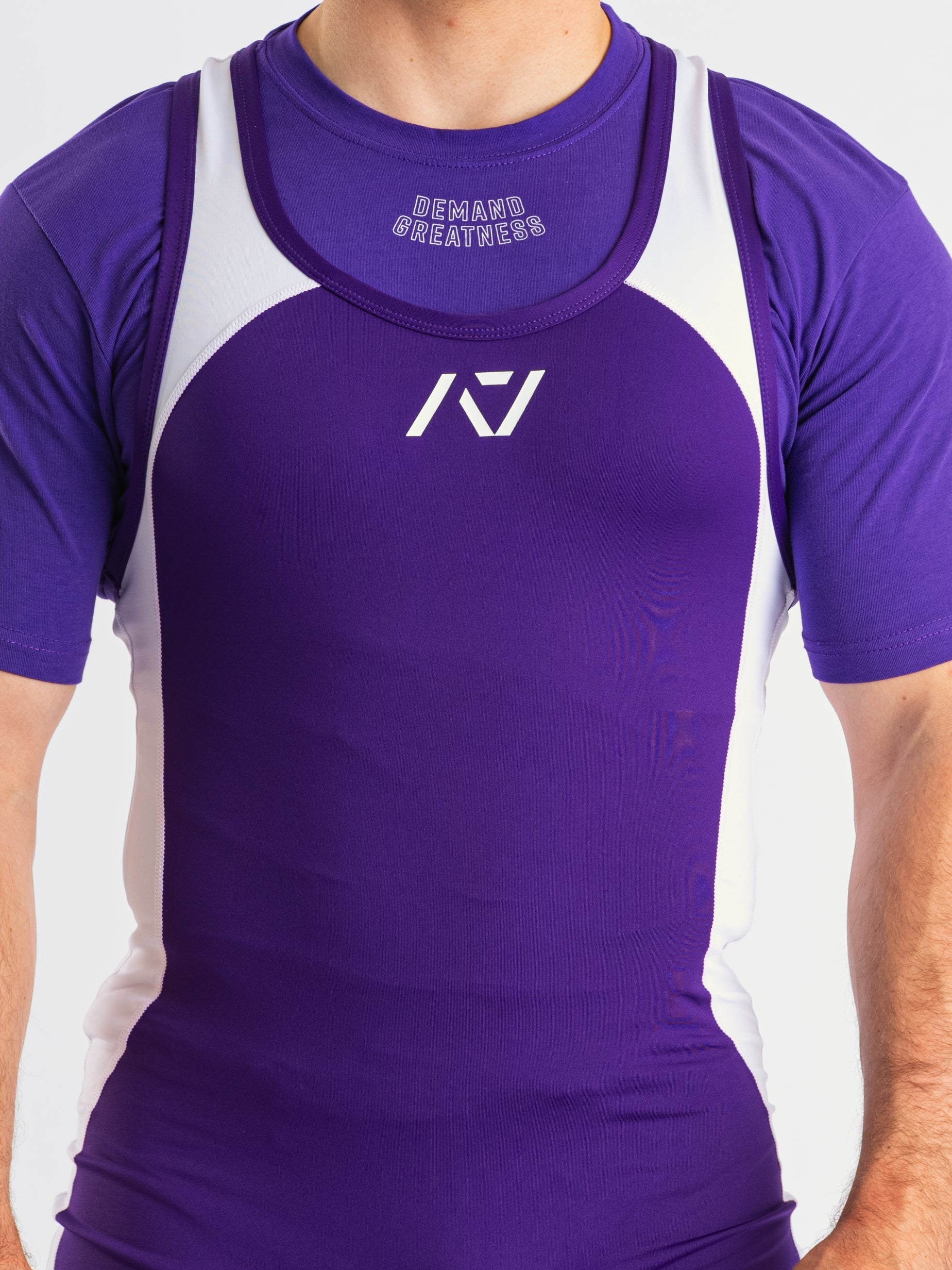 A7 IPF Approved Purple Luno singlet features extra lat mobility, side panel stitching to guide the squat depth level and curved panel design for a slimming look. The Women's cut singlet features a tapered waist and additional quad room. The IPF Approved Kit includes Luno Powerlifting Singlet, A7 Meet Shirt, A7 Zebra Wrist Wraps, A7 Deadlift Socks, Hourglass Knee Sleeves (Stiff Knee Sleeves and Rigor Mortis Knee Sleeves). All A7 Powerlifting Equipment shipping to UK, Norway, Switzerland and Iceland.