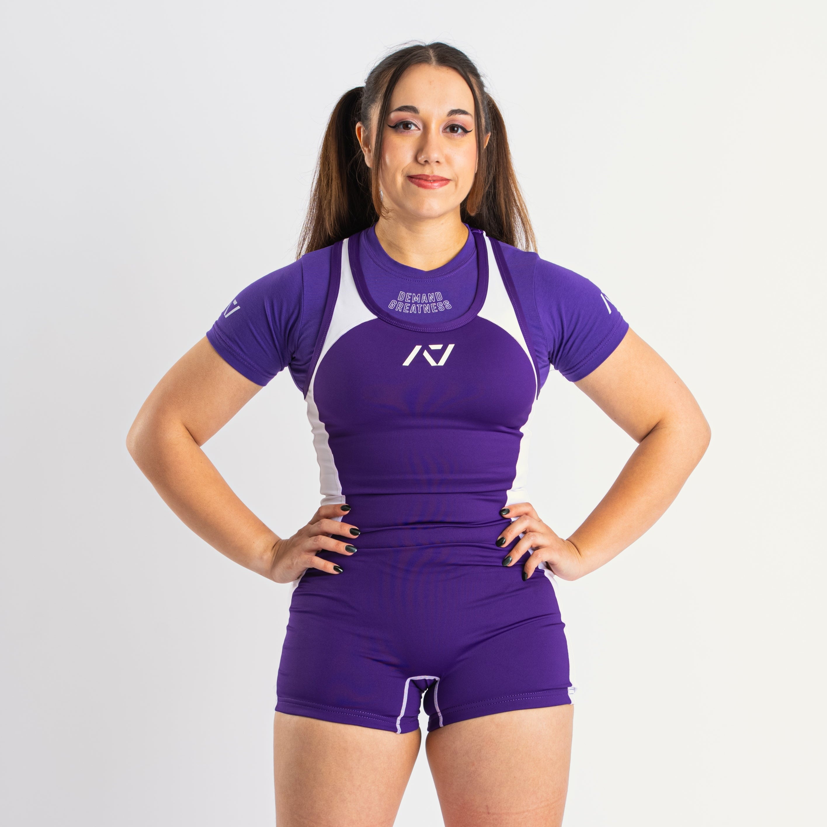 A7 IPF Approved Purple Luno singlet features extra lat mobility, side panel stitching to guide the squat depth level and curved panel design for a slimming look. The Women's cut singlet features a tapered waist and additional quad room. The IPF Approved Kit includes Luno Powerlifting Singlet, A7 Meet Shirt, A7 Zebra Wrist Wraps, A7 Deadlift Socks, Hourglass Knee Sleeves (Stiff Knee Sleeves and Rigor Mortis Knee Sleeves). All A7 Powerlifting Equipment shipping to UK, Norway, Switzerland and Iceland.