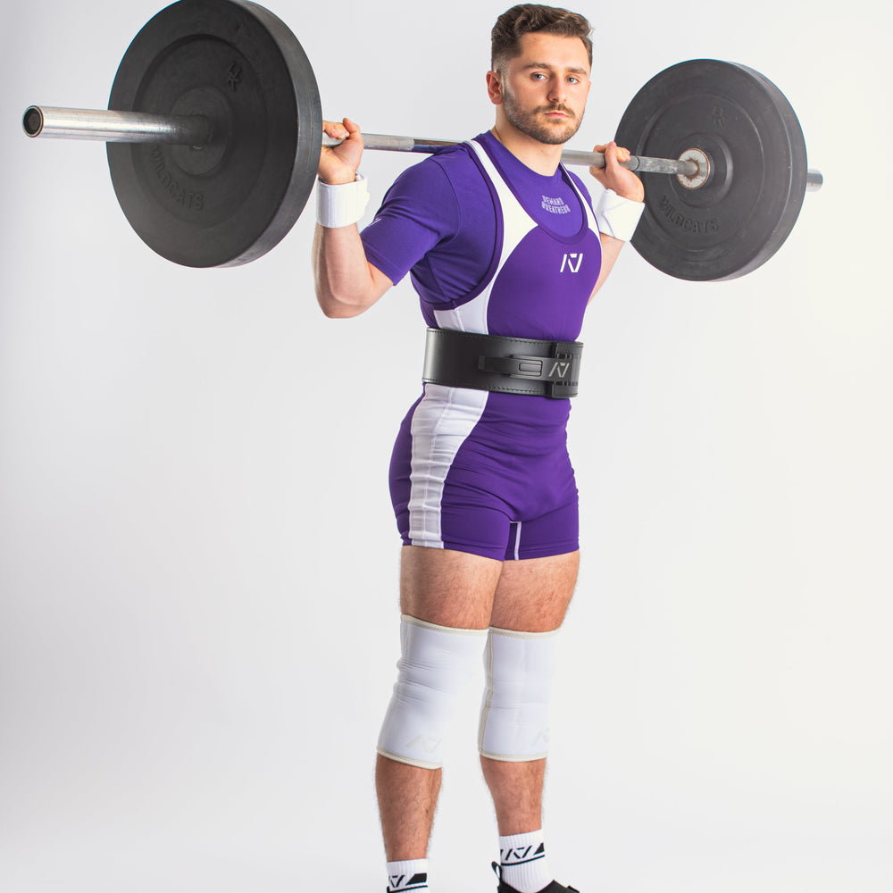 
                      
                        A7 IPF Approved Purple Luno singlet features extra lat mobility, side panel stitching to guide the squat depth level and curved panel design for a slimming look. The Women's cut singlet features a tapered waist and additional quad room. The IPF Approved Kit includes Luno Powerlifting Singlet, A7 Meet Shirt, A7 Zebra Wrist Wraps, A7 Deadlift Socks, Hourglass Knee Sleeves (Stiff Knee Sleeves and Rigor Mortis Knee Sleeves). All A7 Powerlifting Equipment shipping to UK, Norway, Switzerland and Iceland.
                      
                    