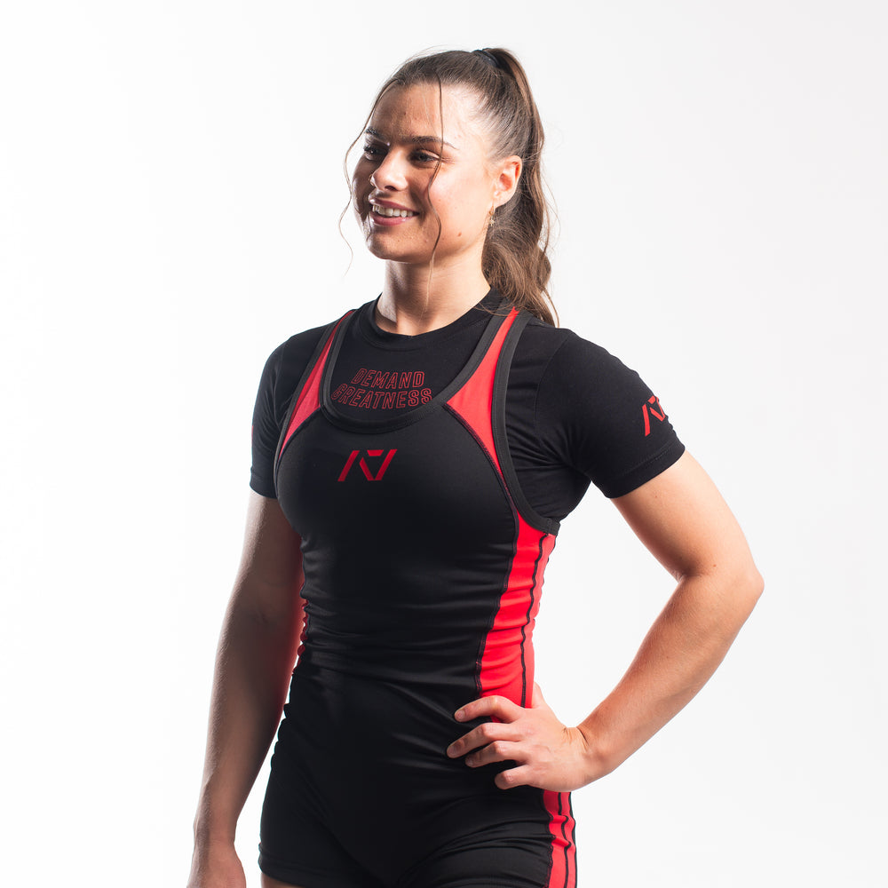 
                      
                        A7 IPF Approved Red Dawn Luno singlet features extra lat mobility, side panel stitching to guide the squat depth level and curved panel design for a slimming look. The Women's cut singlet features a tapered waist and additional quad room. The IPF Approved Kit includes Luno Powerlifting Singlet, A7 Meet Shirt, A7 Zebra Wrist Wraps, A7 Deadlift Socks, Hourglass Knee Sleeves (Stiff Knee Sleeves and Rigor Mortis Knee Sleeves). All A7 Powerlifting Equipment shipping to UK, Norway, Switzerland and Iceland.
                      
                    