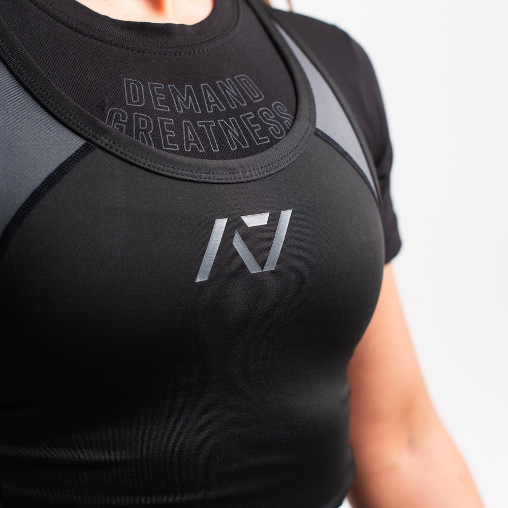 
                      
                        A7 IPF Approved Shadow Stone Luno singlet features extra lat mobility, side panel stitching to guide the squat depth level and curved panel design for a slimming look. The Women's cut singlet features a tapered waist and additional quad room. The IPF Approved Kit includes Luno Powerlifting Singlet, A7 Meet Shirt, A7 Zebra Wrist Wraps, A7 Deadlift Socks, Hourglass Knee Sleeves (Stiff Knee Sleeves and Rigor Mortis Knee Sleeves). All A7 Powerlifting Equipment shipping to UK, Norway, Switzerland and Iceland.
                      
                    