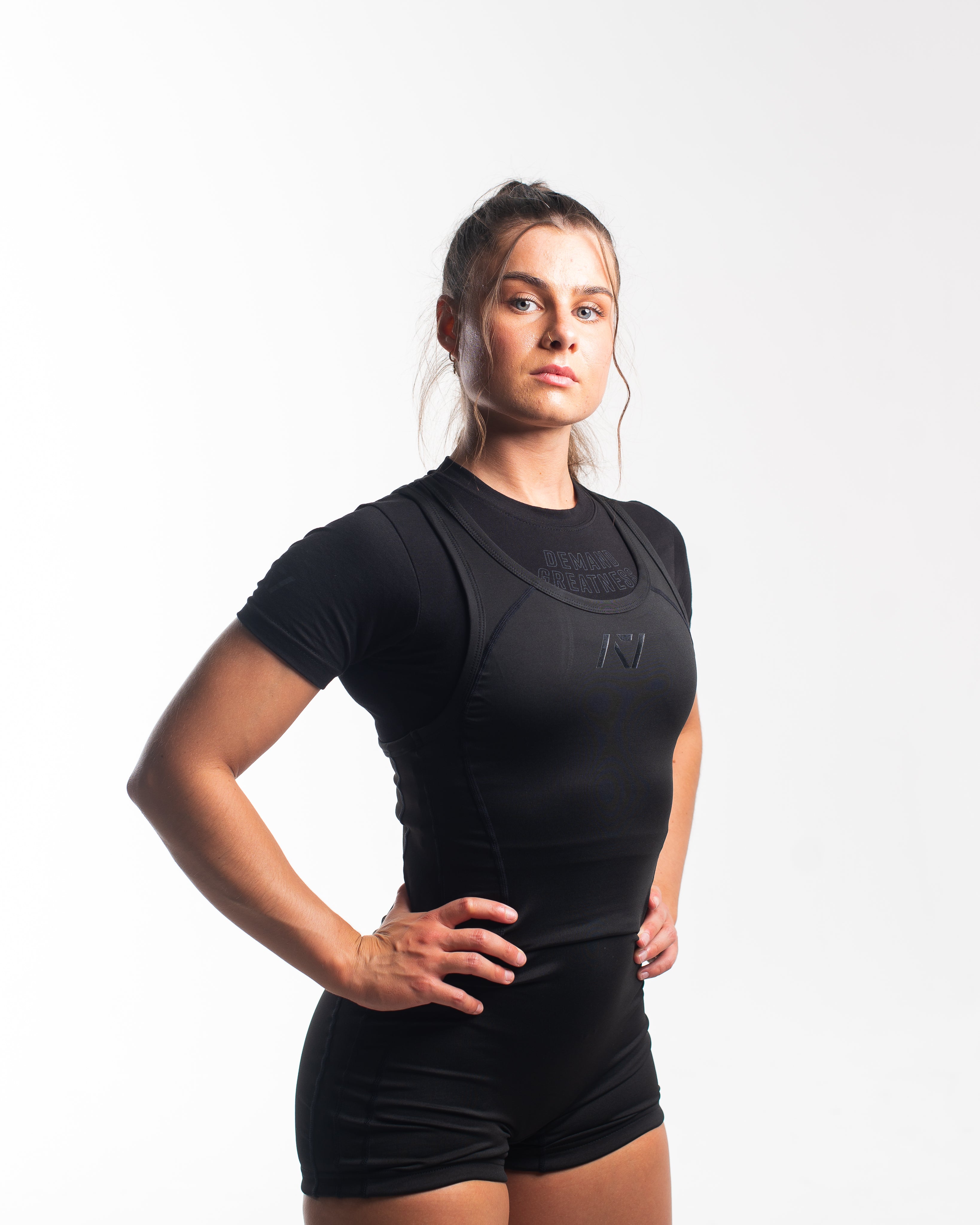 A7 IPF Approved Stealth Luno singlet features extra lat mobility, side panel stitching to guide the squat depth level and curved panel design for a slimming look. The Women's cut singlet features a tapered waist and additional quad room. The IPF Approved Kit includes Luno Powerlifting Singlet, A7 Meet Shirt, A7 Zebra Wrist Wraps, A7 Deadlift Socks, Hourglass Knee Sleeves (Stiff Knee Sleeves and Rigor Mortis Knee Sleeves). All A7 Powerlifting Equipment shipping to UK, Norway, Switzerland and Iceland.