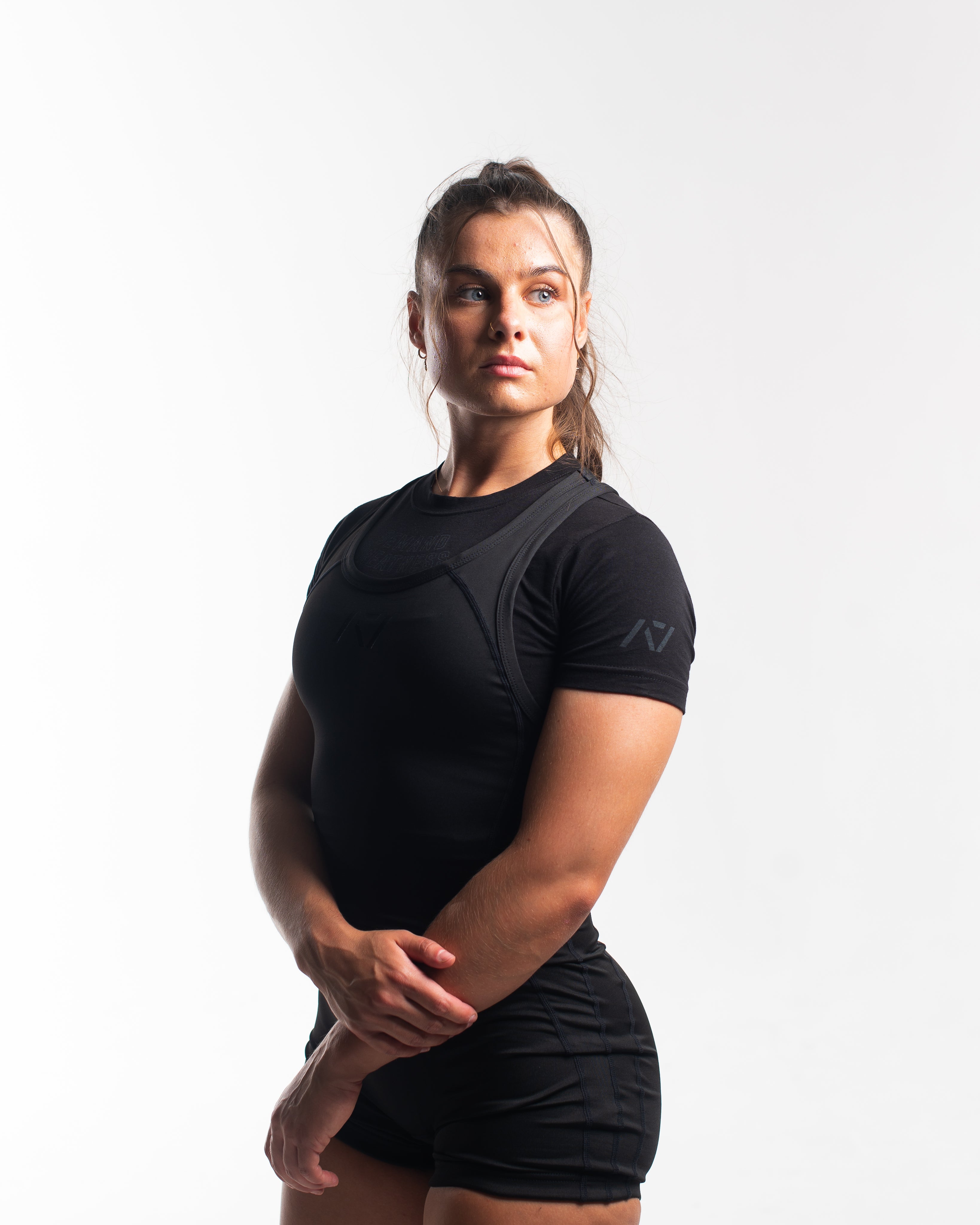 A7 IPF Approved Stealth Luno singlet features extra lat mobility, side panel stitching to guide the squat depth level and curved panel design for a slimming look. The Women's cut singlet features a tapered waist and additional quad room. The IPF Approved Kit includes Luno Powerlifting Singlet, A7 Meet Shirt, A7 Zebra Wrist Wraps, A7 Deadlift Socks, Hourglass Knee Sleeves (Stiff Knee Sleeves and Rigor Mortis Knee Sleeves). All A7 Powerlifting Equipment shipping to UK, Norway, Switzerland and Iceland.