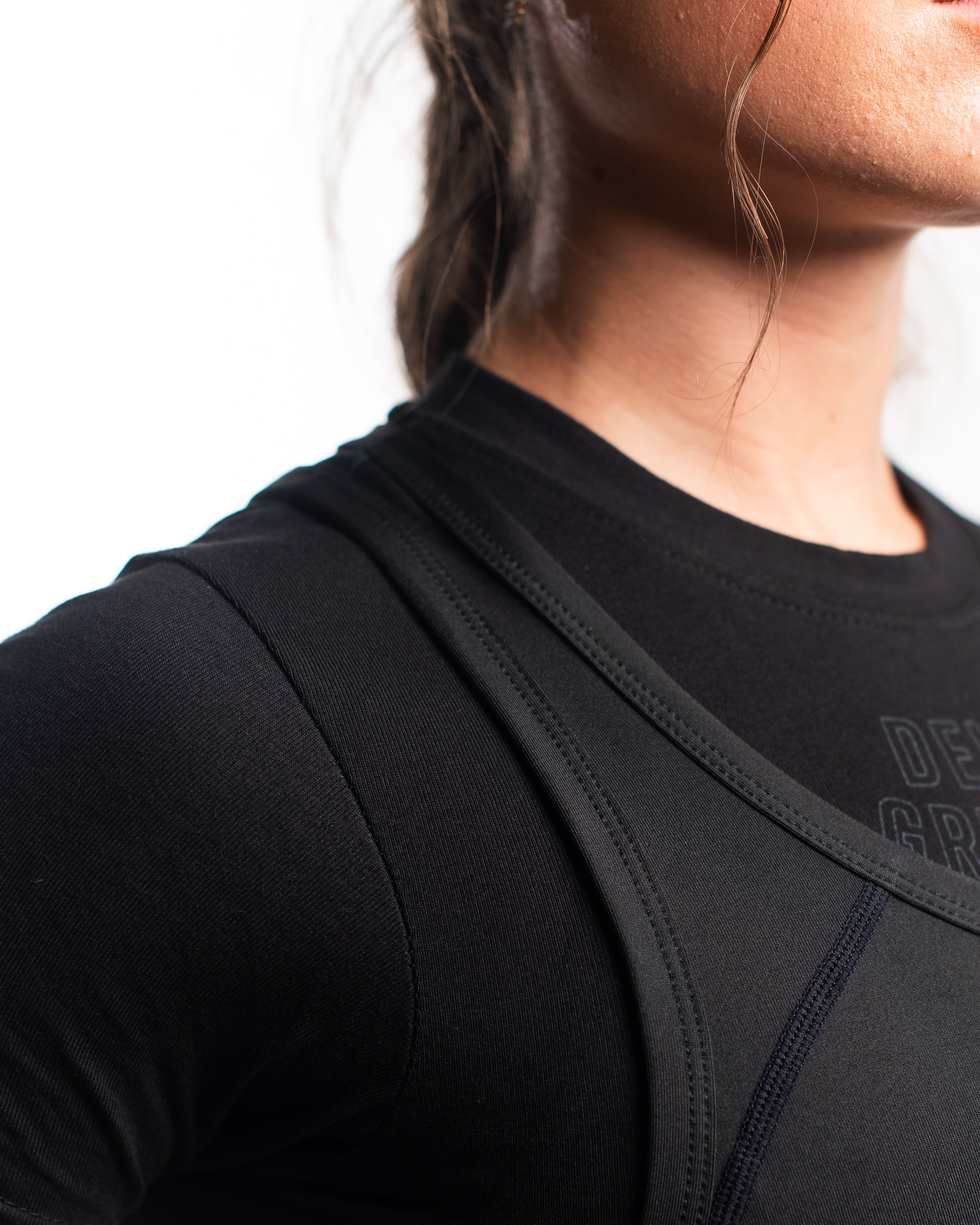 A7 IPF Approved Stealth Luno singlet features extra lat mobility, side panel stitching to guide the squat depth level and curved panel design for a slimming look. The Women's cut singlet features a tapered waist and additional quad room. The IPF Approved Kit includes Luno Powerlifting Singlet, A7 Meet Shirt, A7 Zebra Wrist Wraps, A7 Deadlift Socks, Hourglass Knee Sleeves (Stiff Knee Sleeves and Rigor Mortis Knee Sleeves). All A7 Powerlifting Equipment shipping to UK, Norway, Switzerland and Iceland.