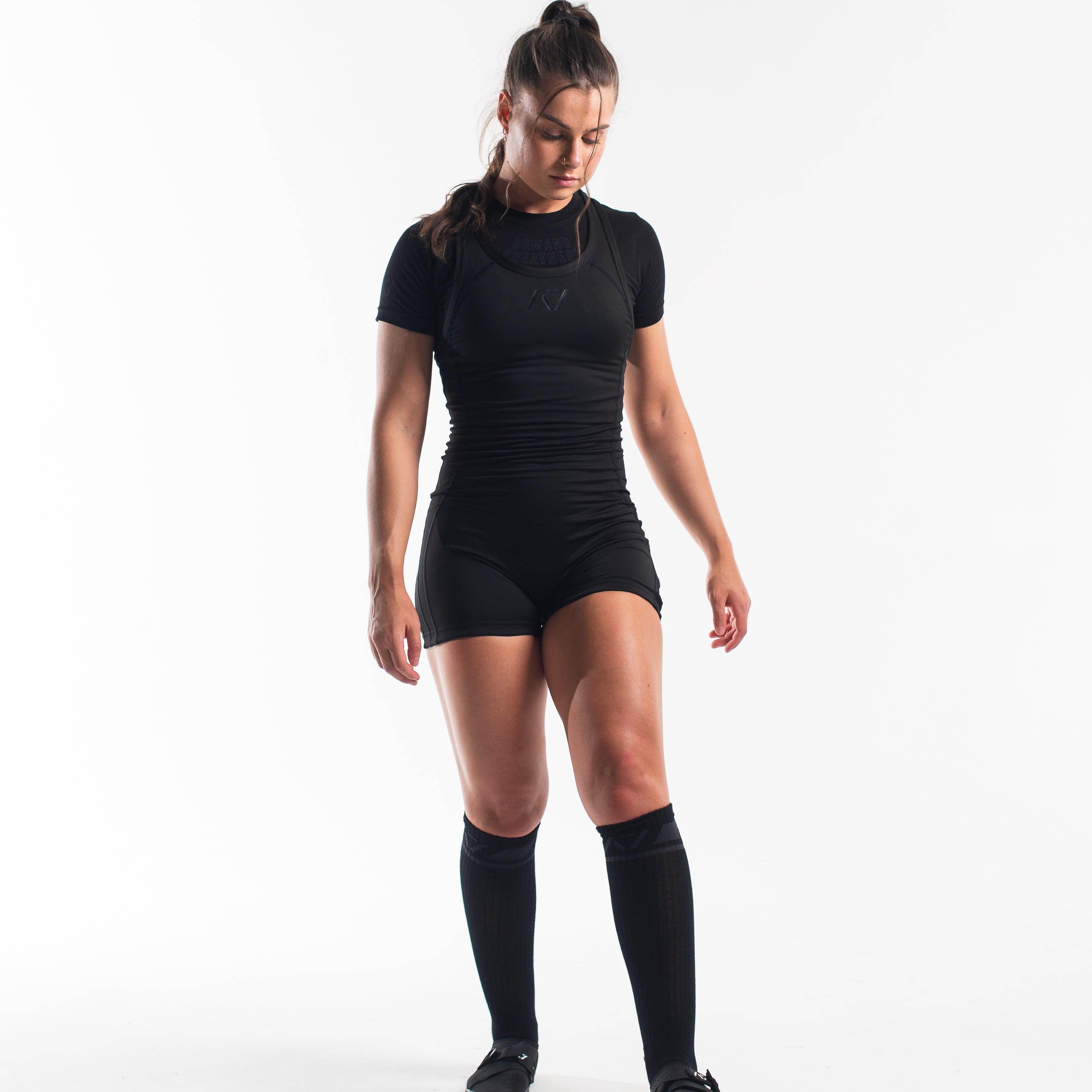 A7 IPF Approved Stealth Luno singlet features extra lat mobility, side panel stitching to guide the squat depth level and curved panel design for a slimming look. The Women's cut singlet features a tapered waist and additional quad room. The IPF Approved Kit includes Luno Powerlifting Singlet, A7 Meet Shirt, A7 Zebra Wrist Wraps, A7 Deadlift Socks, Hourglass Knee Sleeves (Stiff Knee Sleeves and Rigor Mortis Knee Sleeves). All A7 Powerlifting Equipment shipping to UK, Norway, Switzerland and Iceland.