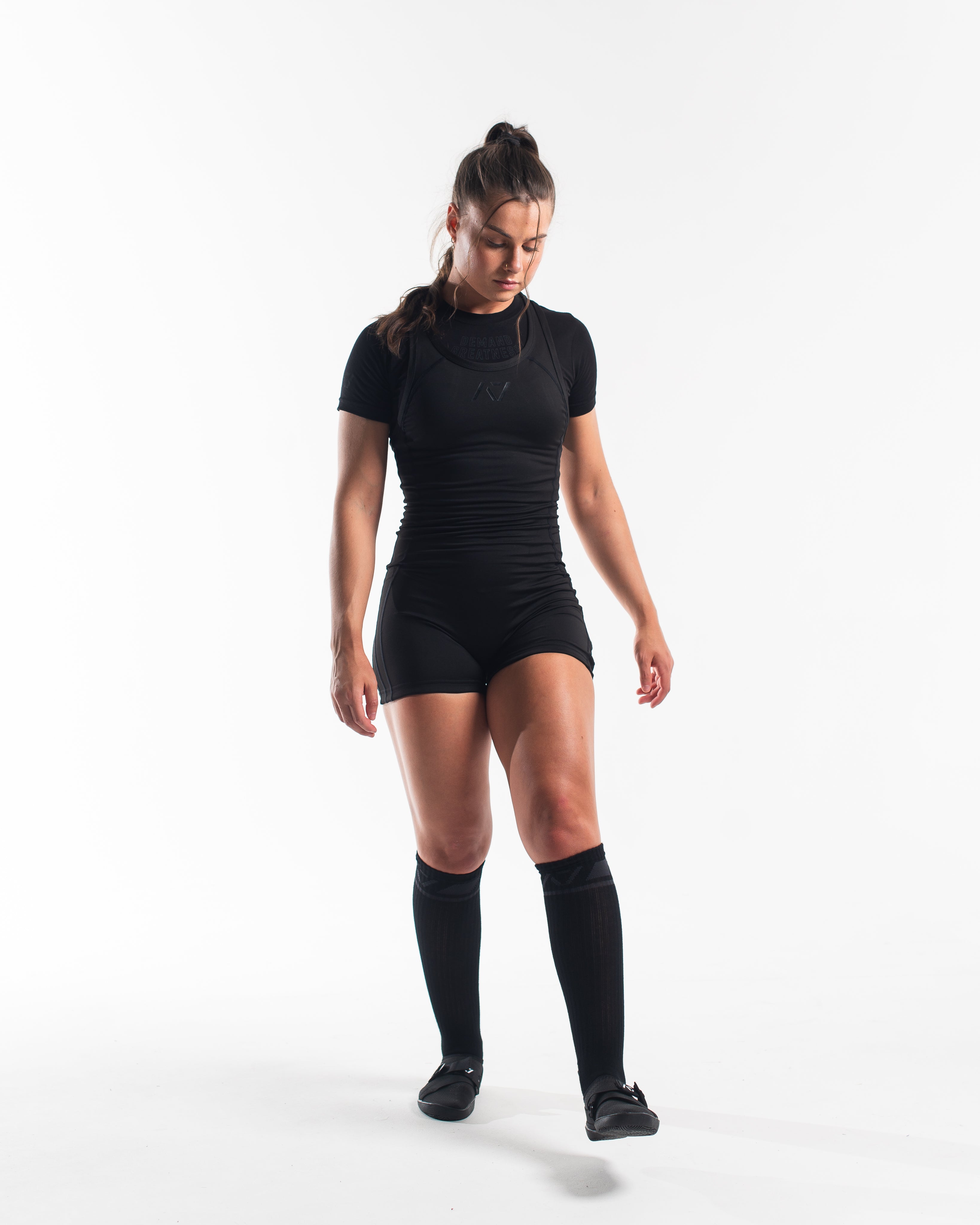 A7 IPF Approved Stealth Luno singlet features extra lat mobility, side panel stitching to guide the squat depth level and curved panel design for a slimming look. The Women's cut singlet features a tapered waist and additional quad room. The IPF Approved Kit includes Luno Powerlifting Singlet, A7 Meet Shirt, A7 Zebra Wrist Wraps, A7 Deadlift Socks, Hourglass Knee Sleeves (Stiff Knee Sleeves and Rigor Mortis Knee Sleeves). All A7 Powerlifting Equipment shipping to UK, Norway, Switzerland and Iceland.