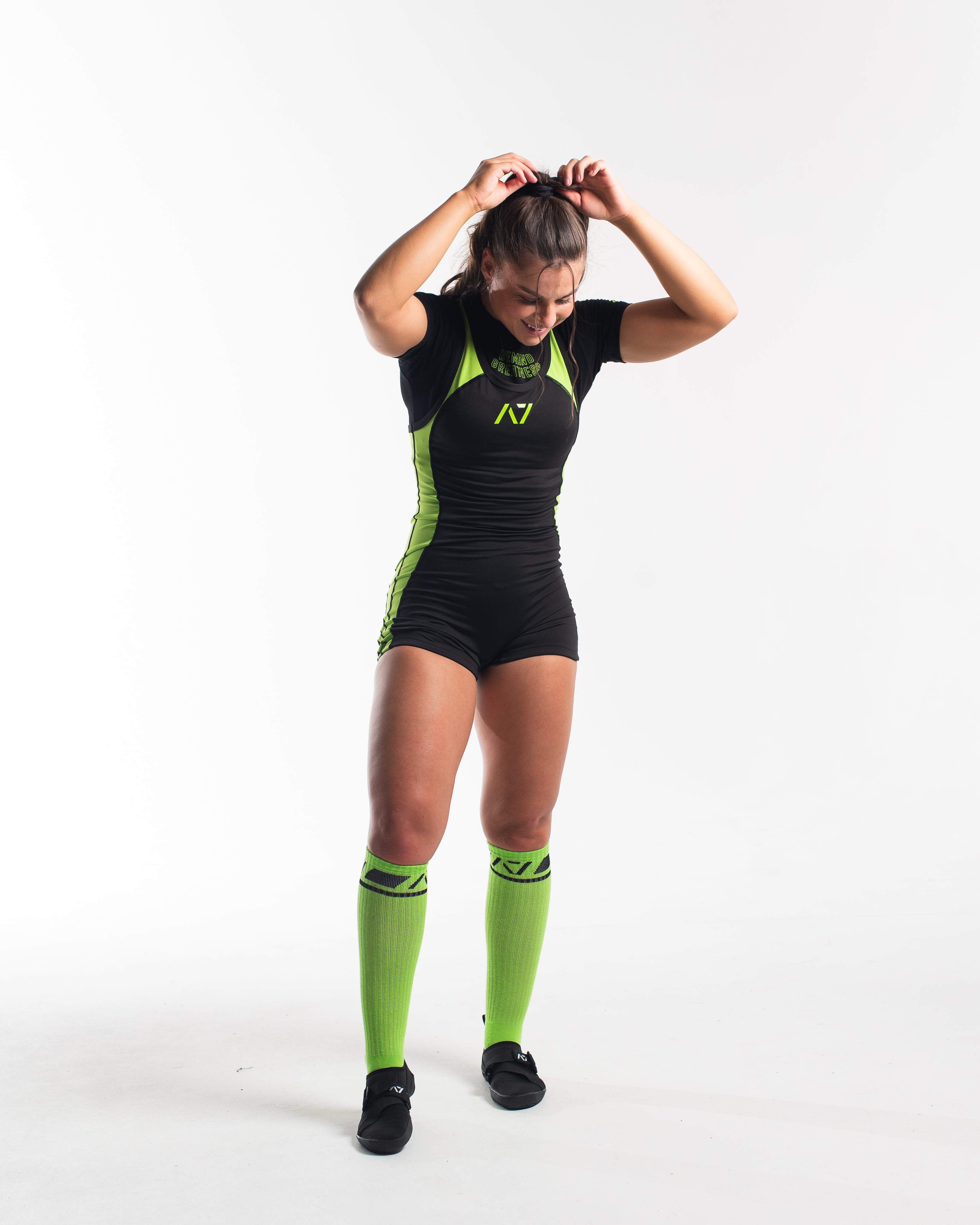 A7 IPF Approved Alien Luno singlet features extra lat mobility, side panel stitching to guide the squat depth level and curved panel design for a slimming look. The Women's cut singlet features a tapered waist and additional quad room. The IPF Approved Kit includes Alien Luno Powerlifting Singlet, A7 Meet Shirt, A7 Deadlift Socks, Hourglass Knee Sleeves (Stiff Knee Sleeves and Rigor Mortis Knee Sleeves). All A7 Powerlifting Equipment shipping to UK, Norway, Switzerland and Iceland.