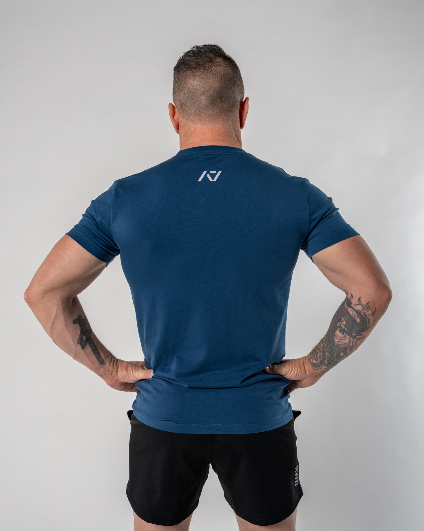 Demand Greatness True-Fit Tides is our new meet shirt design highlighting Demand Greatness with a double outline font to showcase your impact on the platform. The Shirt is IPF Approved. Shop the full A7 Powerlifting IPF Approved Equipment collection. The IPF Approved Kit includes Powerlifting Singlet, A7 Meet Shirt, A7 Zebra Wrist Wraps, A7 Deadlift Socks, Hourglass Knee Sleeves (Stiff and Rigor Mortis Knee Sleeves). All A7 Powerlifting Equipment shipping to UK, Norway, Switzerland and Iceland.