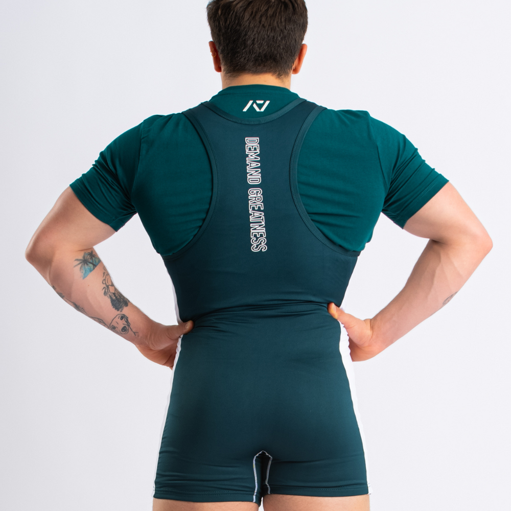 A7 IPF Approved Emerald Forás Luno singlet features extra lat mobility, side panel stitching to guide the squat depth level and curved panel design for a slimming look. The Women's cut singlet features a tapered waist and additional quad room. The IPF Approved Kit includes Luno Powerlifting Singlet, A7 Meet Shirt, A7 Zebra Wrist Wraps, A7 Deadlift Socks, Hourglass Knee Sleeves (Stiff Knee Sleeves and Rigor Mortis Knee Sleeves). All A7 Powerlifting Equipment shipping to UK, Norway, Switzerland and Iceland.