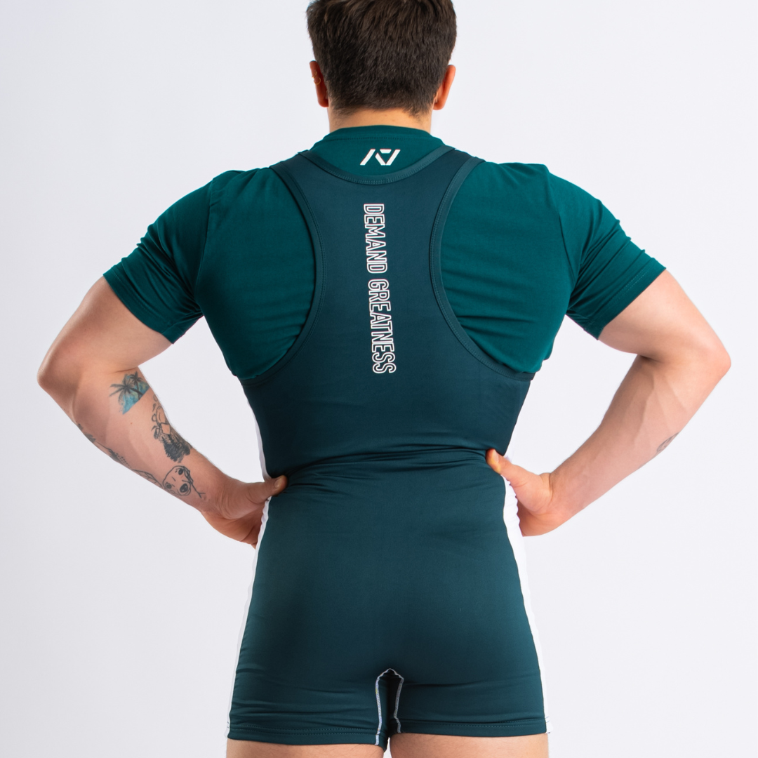 A7 IPF Approved Emerald Forás Luno singlet features extra lat mobility, side panel stitching to guide the squat depth level and curved panel design for a slimming look. The Women's cut singlet features a tapered waist and additional quad room. The IPF Approved Kit includes Luno Powerlifting Singlet, A7 Meet Shirt, A7 Zebra Wrist Wraps, A7 Deadlift Socks, Hourglass Knee Sleeves (Stiff Knee Sleeves and Rigor Mortis Knee Sleeves). All A7 Powerlifting Equipment shipping to UK, Norway, Switzerland and Iceland.