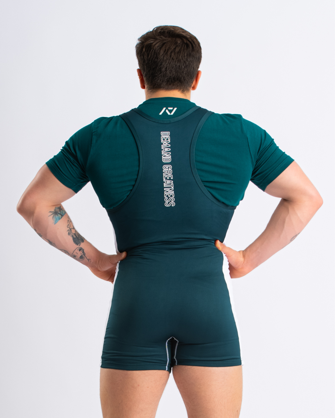 A7 IPF Approved Emerald Forás Luno singlet features extra lat mobility, side panel stitching to guide the squat depth level and curved panel design for a slimming look. The Women's cut singlet features a tapered waist and additional quad room. The IPF Approved Kit includes Luno Powerlifting Singlet, A7 Meet Shirt, A7 Zebra Wrist Wraps, A7 Deadlift Socks, Hourglass Knee Sleeves (Stiff Knee Sleeves and Rigor Mortis Knee Sleeves). All A7 Powerlifting Equipment shipping to UK, Norway, Switzerland and Iceland.