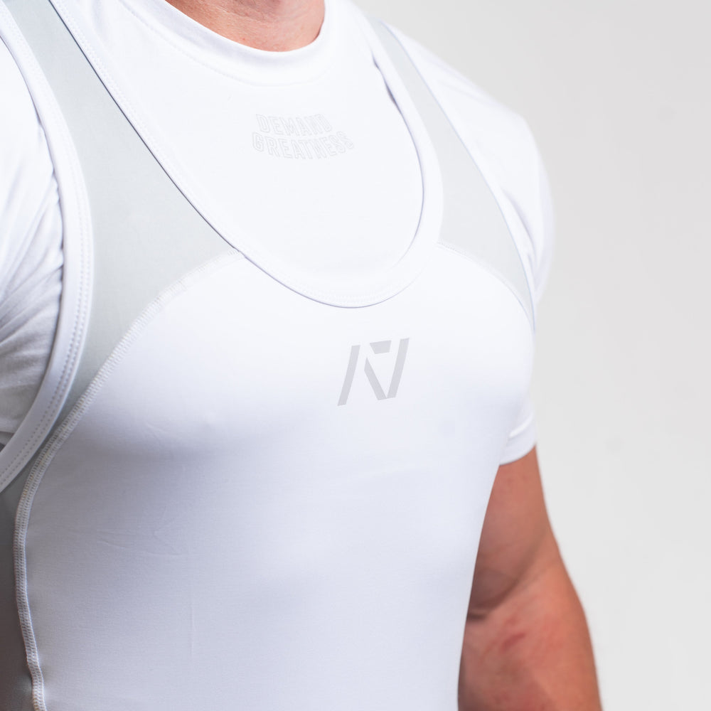 
                      
                        A7 IPF Approved Polar Luno singlet features extra lat mobility, side panel stitching to guide the squat depth level and curved panel design for a slimming look. The Women's cut singlet features a tapered waist and additional quad room. The IPF Approved Kit includes Luno Powerlifting Singlet, A7 Meet Shirt, A7 Zebra Wrist Wraps, A7 Deadlift Socks, Hourglass Knee Sleeves (Stiff Knee Sleeves and Rigor Mortis Knee Sleeves). All A7 Powerlifting Equipment shipping to UK, Norway, Switzerland and Iceland.
                      
                    