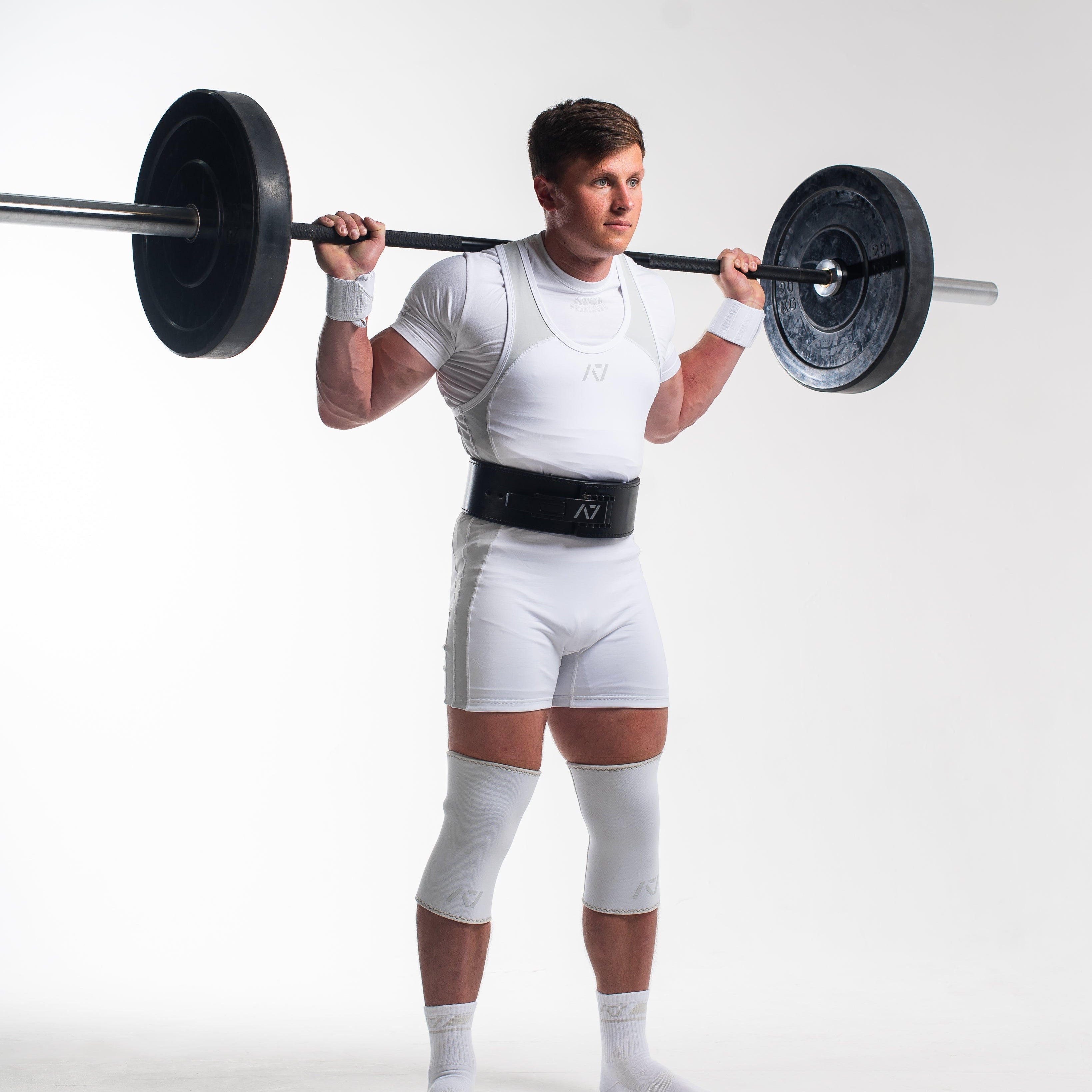 A7 IPF Approved Polar Luno singlet features extra lat mobility, side panel stitching to guide the squat depth level and curved panel design for a slimming look. The Women's cut singlet features a tapered waist and additional quad room. The IPF Approved Kit includes Luno Powerlifting Singlet, A7 Meet Shirt, A7 Zebra Wrist Wraps, A7 Deadlift Socks, Hourglass Knee Sleeves (Stiff Knee Sleeves and Rigor Mortis Knee Sleeves). All A7 Powerlifting Equipment shipping to UK, Norway, Switzerland and Iceland.