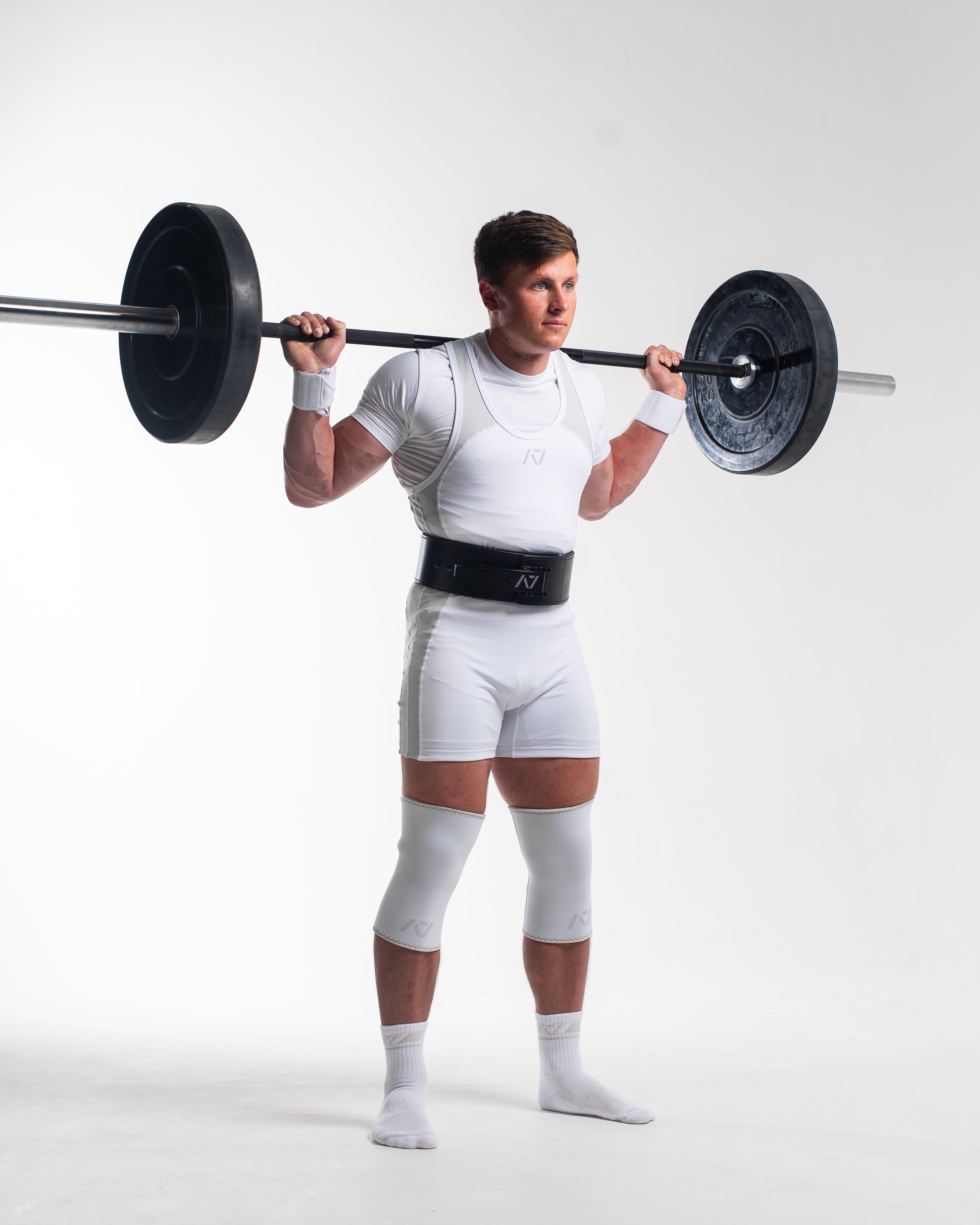 A7 IPF Approved Polar Luno singlet features extra lat mobility, side panel stitching to guide the squat depth level and curved panel design for a slimming look. The Women's cut singlet features a tapered waist and additional quad room. The IPF Approved Kit includes Luno Powerlifting Singlet, A7 Meet Shirt, A7 Zebra Wrist Wraps, A7 Deadlift Socks, Hourglass Knee Sleeves (Stiff Knee Sleeves and Rigor Mortis Knee Sleeves). All A7 Powerlifting Equipment shipping to UK, Norway, Switzerland and Iceland.