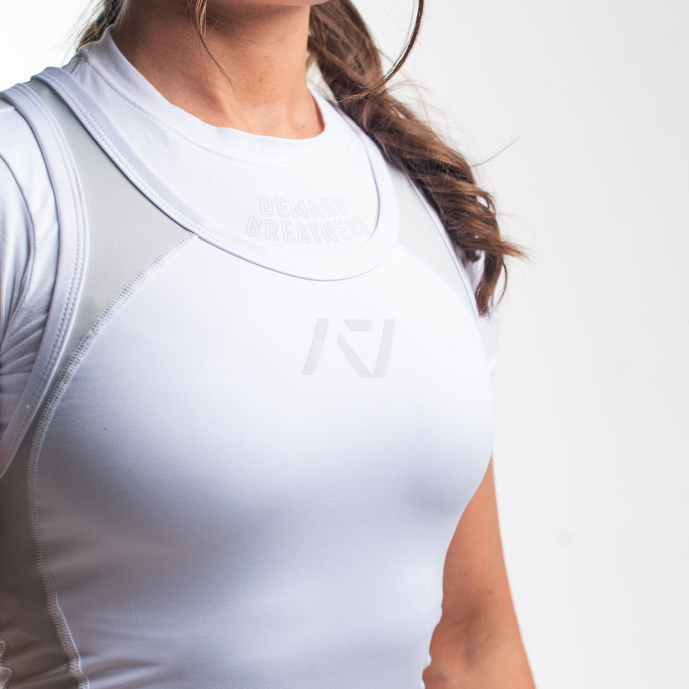 
                      
                        A7 IPF Approved Polar Luno singlet features extra lat mobility, side panel stitching to guide the squat depth level and curved panel design for a slimming look. The Women's cut singlet features a tapered waist and additional quad room. The IPF Approved Kit includes Luno Powerlifting Singlet, A7 Meet Shirt, A7 Zebra Wrist Wraps, A7 Deadlift Socks, Hourglass Knee Sleeves (Stiff Knee Sleeves and Rigor Mortis Knee Sleeves). All A7 Powerlifting Equipment shipping to UK, Norway, Switzerland and Iceland.
                      
                    