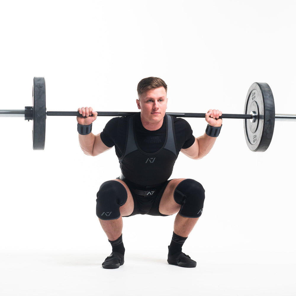
                      
                        A7 IPF Approved Hourglass Knee Sleeves feature an hourglass-shaped centre taper fit to help provide knee compression while maintaining proper tightness around the calf and quad, offered in three stiffnesses (Flexi, Stiff and Rigor Mortis). Shop the full A7 Powerlifting IPF Approved Equipment collection. The IPF Approved Kit includes Powerlifting Singlet, A7 Meet Shirt, A7 Zebra Wrist Wraps and A7 Deadlift Socks. All A7 Powerlifting Equipment shipping to UK, Norway, Switzerland and Iceland. 
                      
                    