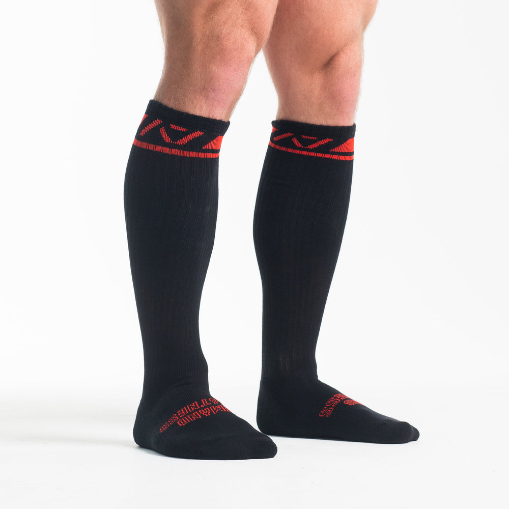 
                      
                        A7 Red Dawn Deadlift socks are designed specifically for pulls and keep your shins protected from scrapes. A7 deadlift socks are a perfect pair to wear in training or powerlifting competition. The IPF Approved Kit includes Powerlifting Singlet, A7 Meet Shirt, A7 Zebra Wrist Wraps, A7 Deadlift Socks, Hourglass Knee Sleeves (Stiff Knee Sleeves and Rigor Mortis Knee Sleeves). All A7 Powerlifting Equipment shipping to UK, Norway, Switzerland and Iceland.
                      
                    