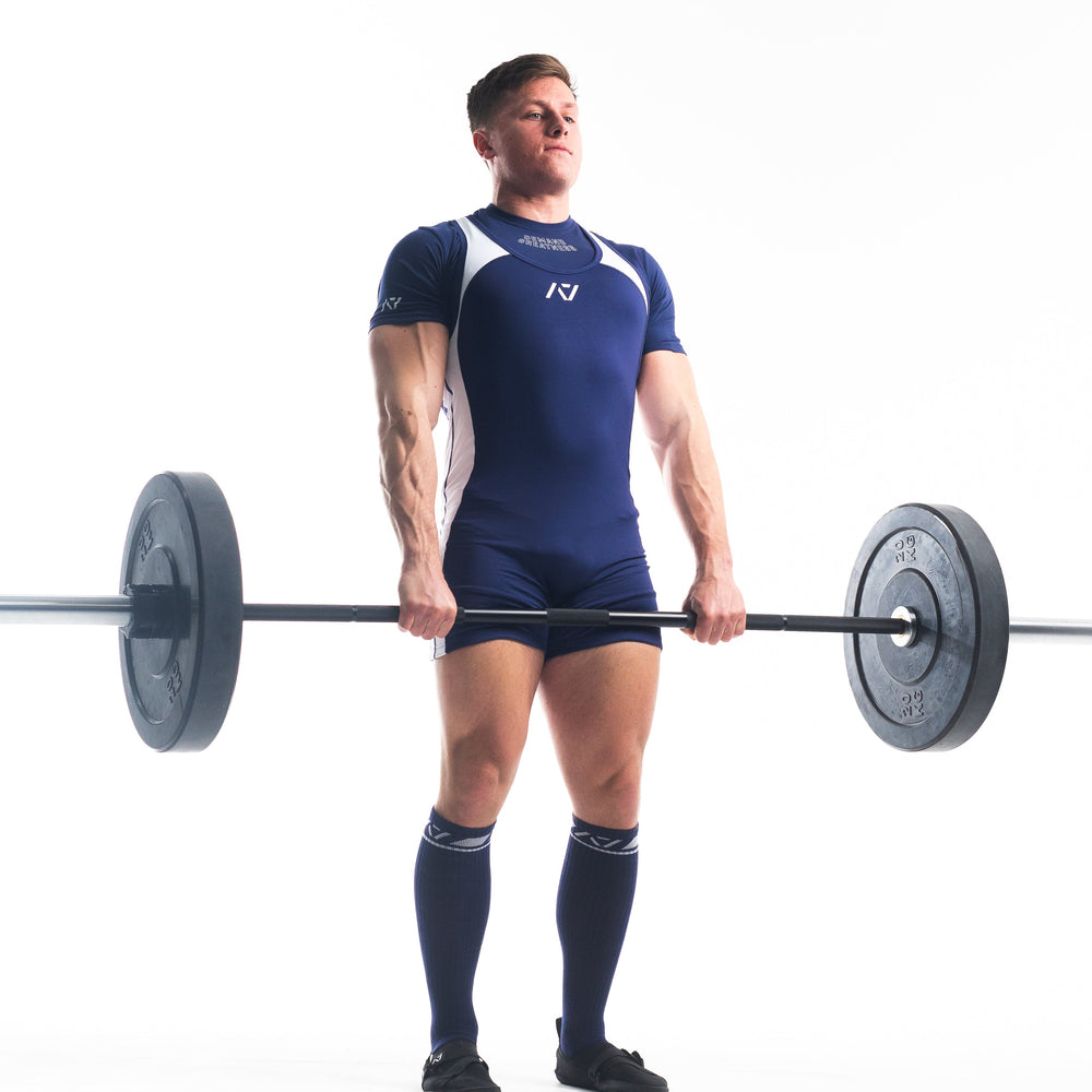 
                      
                        A7 IPF Approved Night Light Luno singlet features extra lat mobility, side panel stitching to guide the squat depth level and curved panel design for a slimming look. The Women's cut singlet features a tapered waist and additional quad room. The IPF Approved Kit includes Luno Powerlifting Singlet, A7 Meet Shirt, A7 Zebra Wrist Wraps, A7 Deadlift Socks, Hourglass Knee Sleeves (Stiff Knee Sleeves and Rigor Mortis Knee Sleeves). All A7 Powerlifting Equipment shipping to UK, Norway, Switzerland and Iceland.
                      
                    