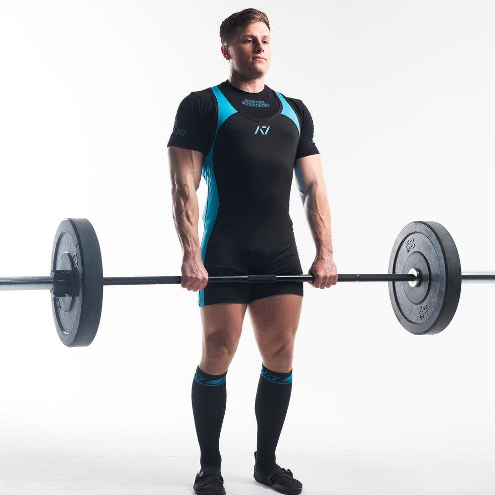 
                      
                        A7 IPF Approved Azul Luno singlet features extra lat mobility, side panel stitching to guide the squat depth level and curved panel design for a slimming look. The Women's cut singlet features a tapered waist and additional quad room. The IPF Approved Kit includes Luno Powerlifting Singlet, A7 Meet Shirt, A7 Deadlift Socks, Hourglass Knee Sleeves (Stiff Knee Sleeves and Rigor Mortis Knee Sleeves). All A7 Powerlifting Equipment shipping to UK, Norway, Switzerland and Iceland.
                      
                    