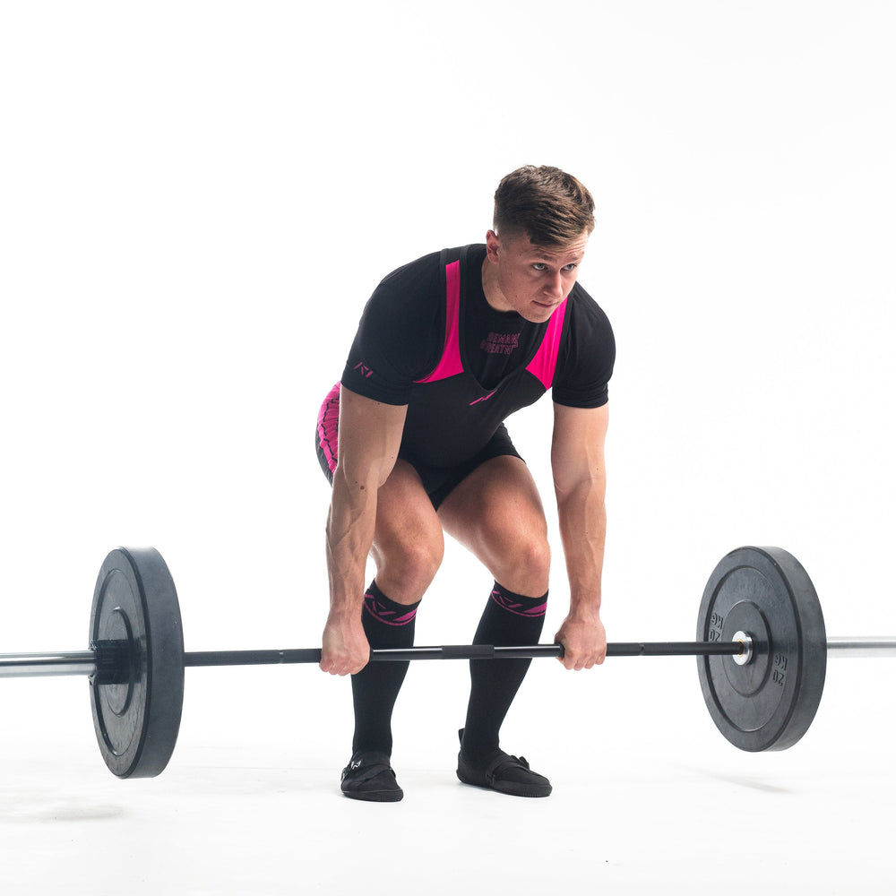 
                      
                        A7 IPF Approved Flamingo Luno singlet features extra lat mobility, side panel stitching to guide the squat depth level and curved panel design for a slimming look. The Women's cut singlet features a tapered waist and additional quad room. The IPF Approved Kit includes Luno Powerlifting Singlet, A7 Meet Shirt, A7 Zebra Wrist Wraps, A7 Deadlift Socks, Hourglass Knee Sleeves (Stiff Knee Sleeves and Rigor Mortis Knee Sleeves). All A7 Powerlifting Equipment shipping to UK, Norway, Switzerland and Iceland.
                      
                    