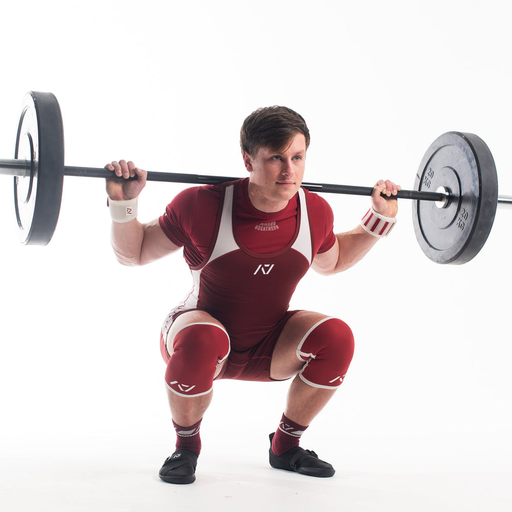 
                      
                        A7 IPF Approved Hourglass Knee Sleeves feature an hourglass-shaped centre taper fit to help provide knee compression while maintaining proper tightness around the calf and quad, offered in three stiffnesses (Flexi, Stiff and Rigor Mortis). Shop the full A7 Powerlifting IPF Approved Equipment collection. The IPF Approved Kit includes Powerlifting Singlet, A7 Meet Shirt, A7 Zebra Wrist Wraps and A7 Deadlift Socks. All A7 Powerlifting Equipment shipping to UK, Norway, Switzerland and Iceland.
                      
                    