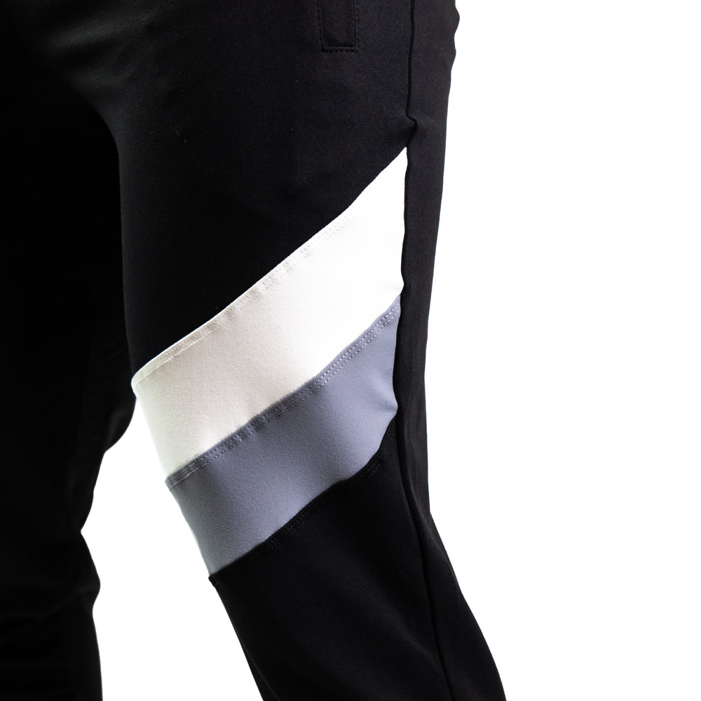 
                      
                        Defy Joggers have likely become a staple in your wardrobe. With our newest Monochrome design colourway we set out to provide a unique yet simple monochrome colour combo to match with all the stealth, gray, white and even more poppy colours of your current collection or many of the pieces we have available.
                      
                    