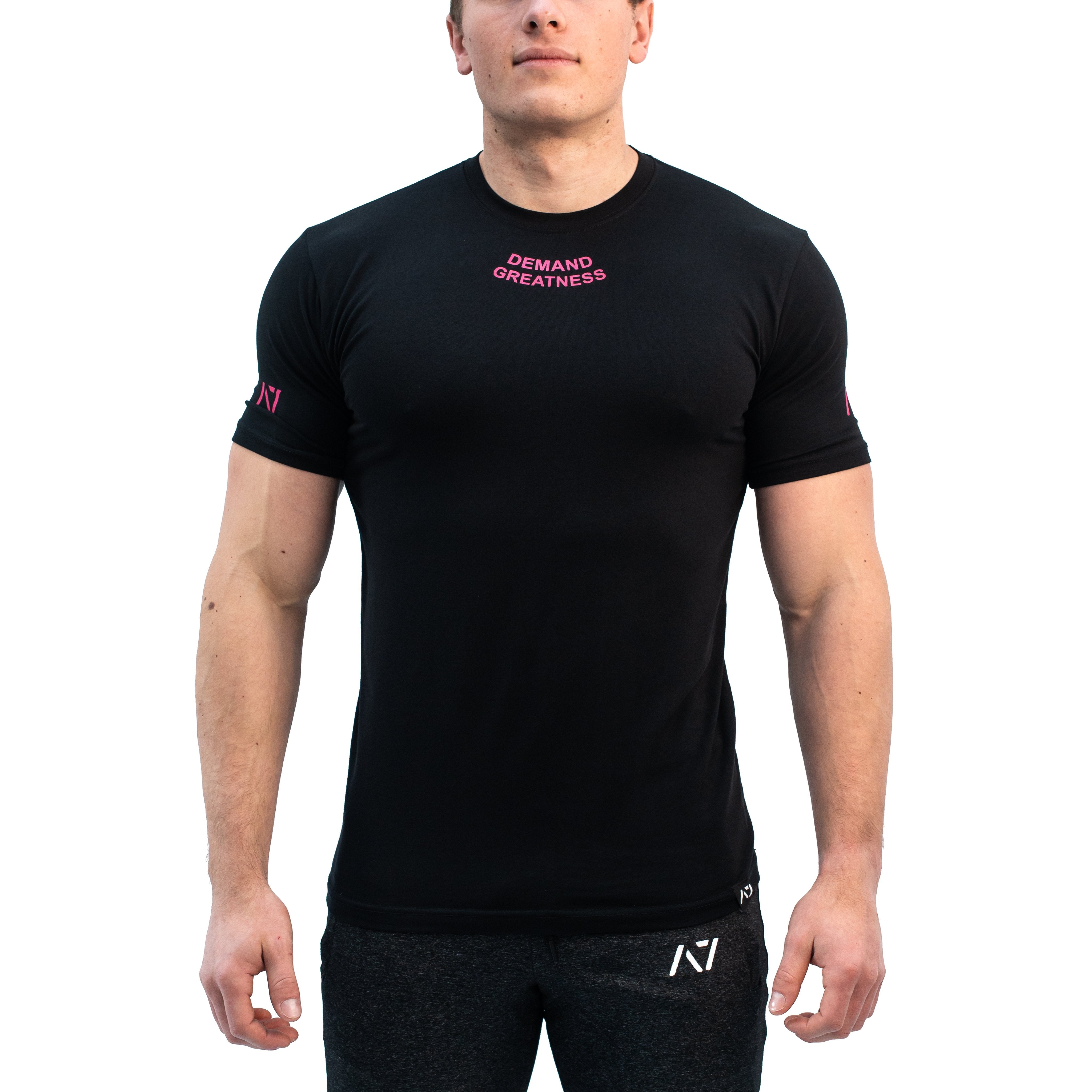 Standout from the crowd in our Pink Demand Greatness Meet Shirt and let your energy show on the platform, in your training or while out and about. Our Meet tees offer a level of comfort like no other through their unique blend of materials and stretch in the places you desire for a comfortable fit that keeps your mind on your performance