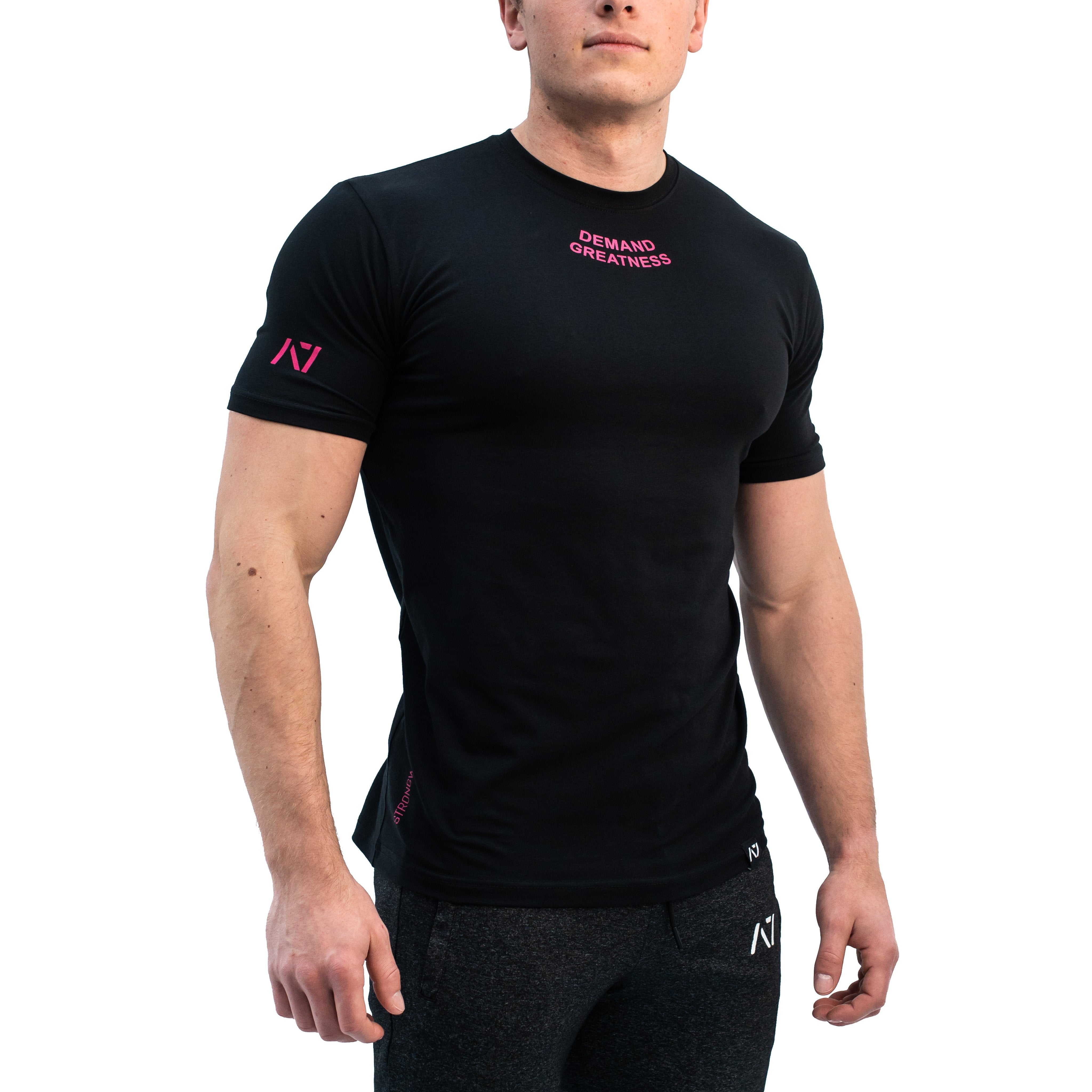 Standout from the crowd in our Pink Demand Greatness Meet Shirt and let your energy show on the platform, in your training or while out and about. Our Meet tees offer a level of comfort like no other through their unique blend of materials and stretch in the places you desire for a comfortable fit that keeps your mind on your performance