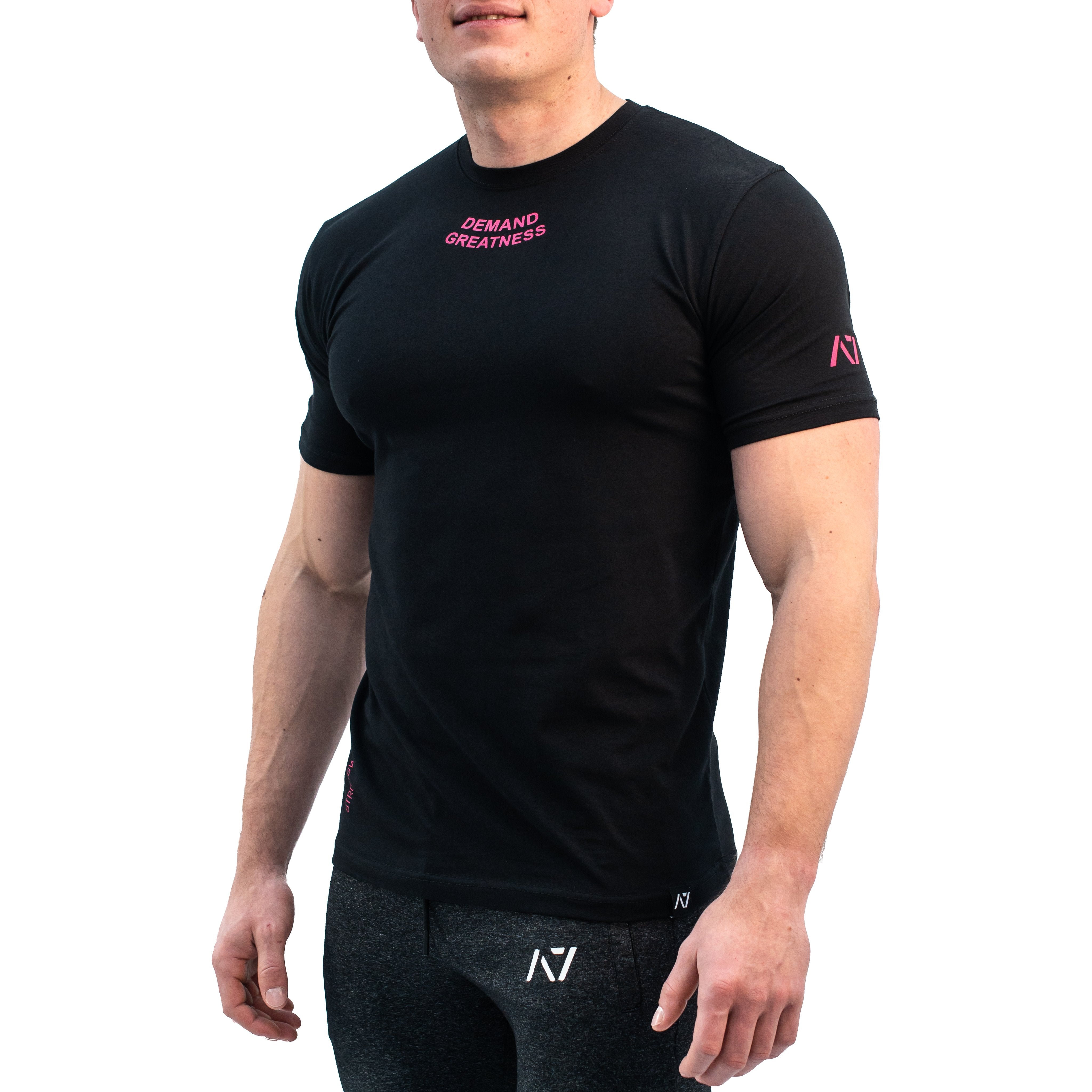 Standout from the crowd in our Pink Demand Greatness Meet Shirt and let your energy show on the platform, in your training or while out and about. Our Meet tees offer a level of comfort like no other through their unique blend of materials and stretch in the places you desire for a comfortable fit that keeps your mind on your performance