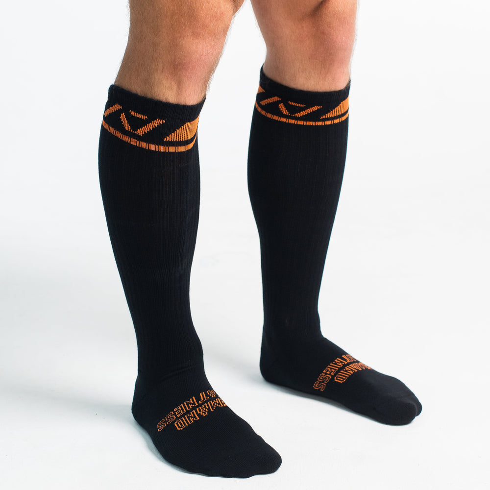 
                      
                        A7 Blaze deadlift socks are designed specifically for pulls and keep your shins protected from scrapes. A7 deadlift socks are a perfect pair to wear in training or powerlifting competition. The A7 IPF Approved Kit includes Powerlifting Singlet, A7 Meet Shirt, A7 Zebra Wrist Wraps, A7 Deadlift Socks, Hourglass Knee Sleeves (Stiff Knee Sleeves and Rigor Mortis Knee Sleeves). All A7 Powerlifting Equipment shipping to UK, Norway, Switzerland and Iceland.
                      
                    