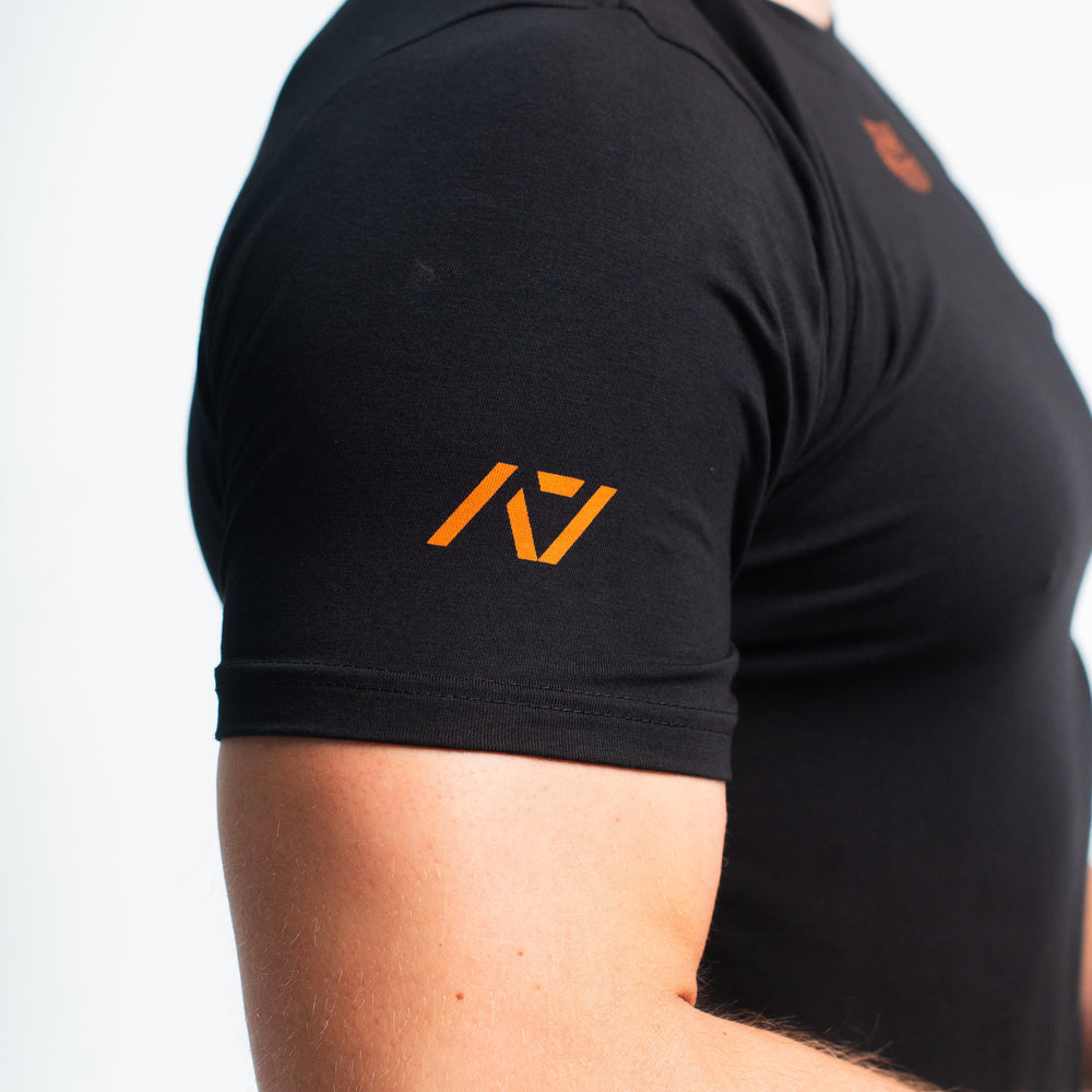 
                      
                        DG23 Blaze is our new meet shirt design highlighting Demand Greatness with a double outline font to showcase your impact on the platform. The DG23 Meet Shirt is IPF Approved. Shop the full A7 Powerlifting IPF Approved Equipment collection. The IPF Approved Kit includes Powerlifting Singlet, A7 Meet Shirt, A7 Zebra Wrist Wraps, A7 Deadlift Socks, Hourglass Knee Sleeves (Stiff Knee Sleeves and Rigor Mortis Knee Sleeves). All A7 Powerlifting Equipment shipping to UK, Norway, Switzerland and Iceland. 
                      
                    