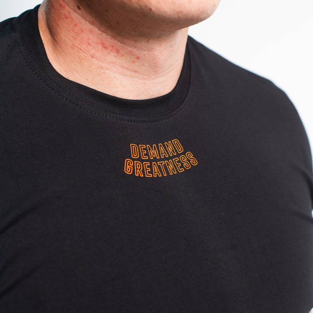 
                      
                        DG23 Blaze is our new meet shirt design highlighting Demand Greatness with a double outline font to showcase your impact on the platform. The DG23 Meet Shirt is IPF Approved. Shop the full A7 Powerlifting IPF Approved Equipment collection. The IPF Approved Kit includes Powerlifting Singlet, A7 Meet Shirt, A7 Zebra Wrist Wraps, A7 Deadlift Socks, Hourglass Knee Sleeves (Stiff Knee Sleeves and Rigor Mortis Knee Sleeves). All A7 Powerlifting Equipment shipping to UK, Norway, Switzerland and Iceland. 
                      
                    