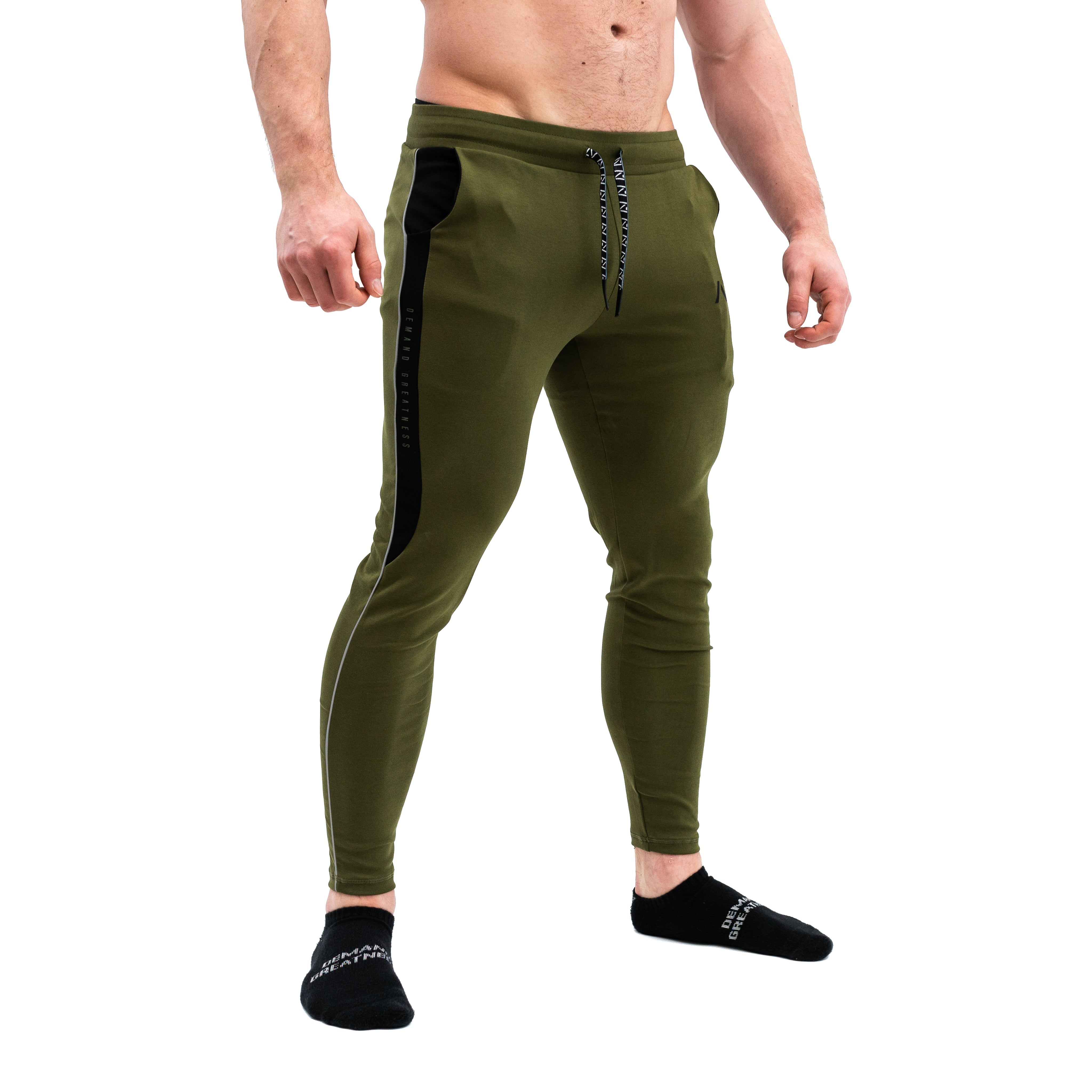 Our Moxie Joggers are made with premium cotton spandex fabric to keep you comfy throughout the day whether you are training or going out! Our Moxie Joggers contour to your body and feature a reflective stripe on both side, deep un-zippered pockets and stealth matte logos. Now in our new military colourway. You can purchase Military Moxie joggers from A7 UK or A7 Europe. A7 UK shipping to UK, Ireland, France, Italy, Germany, the Netherlands, Sweden and Poland.