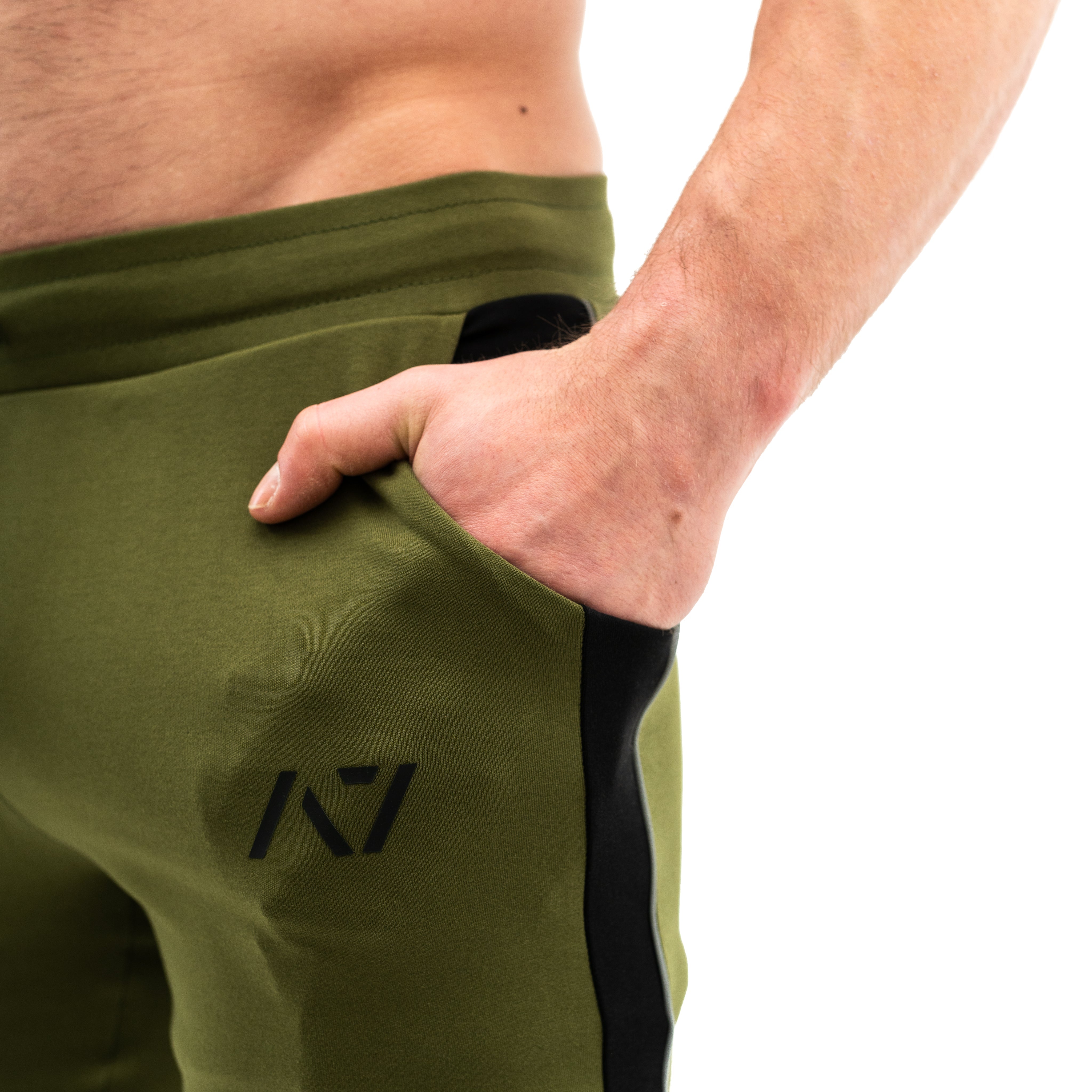 Our Moxie Joggers are made with premium cotton spandex fabric to keep you comfy throughout the day whether you are training or going out! Our Moxie Joggers contour to your body and feature a reflective stripe on both side, deep un-zippered pockets and stealth matte logos. Now in our new military colourway. You can purchase Military Moxie joggers from A7 UK or A7 Europe. A7 UK shipping to UK, Ireland, France, Italy, Germany, the Netherlands, Sweden and Poland.