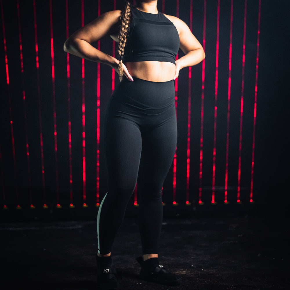 
                      
                        A7 XO Hew Leggings made from the same material as our XO Leggings, but are designed for 'thiccer' body types. The A7 XO Hew have high waistband to be more slimming around your waist and belly and have no seam line on the front for more comfortable movement. Purchase A7 XO Hew Leggings from A7 UK for shipping to UK and Europe. Women’s leggings for powerlifting and training in the gym. Weightlifting leggings for women. 
                      
                    