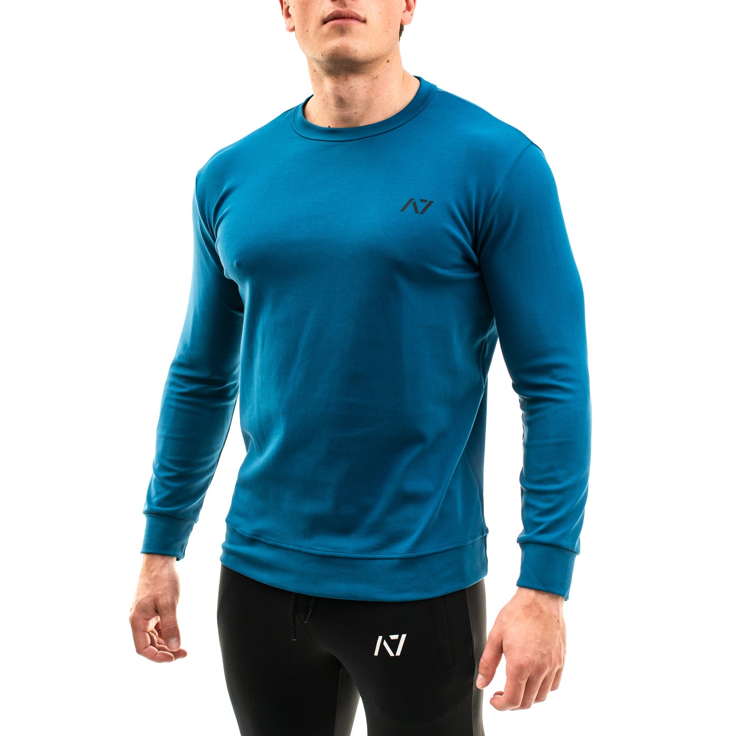 A7 Moxie Crewnecks are part of the A7 balance collection which combines comfort and aesthetics. The pieces in this collection are made with comfortable fabrics and minimal logos to create a simple, yet impactful look. Moxie Crewnecks have 4-way stretch material to move with your shape. A7 crewneck perfect for in and out the gym. Purchase A7 Moxie Creckneck from A7 Europe. Purchase A7 Moxie Crewneck from A7 UK. Available in UK and Europe including France, Italy, Germany, the Netherlands, Sweden and Poland.