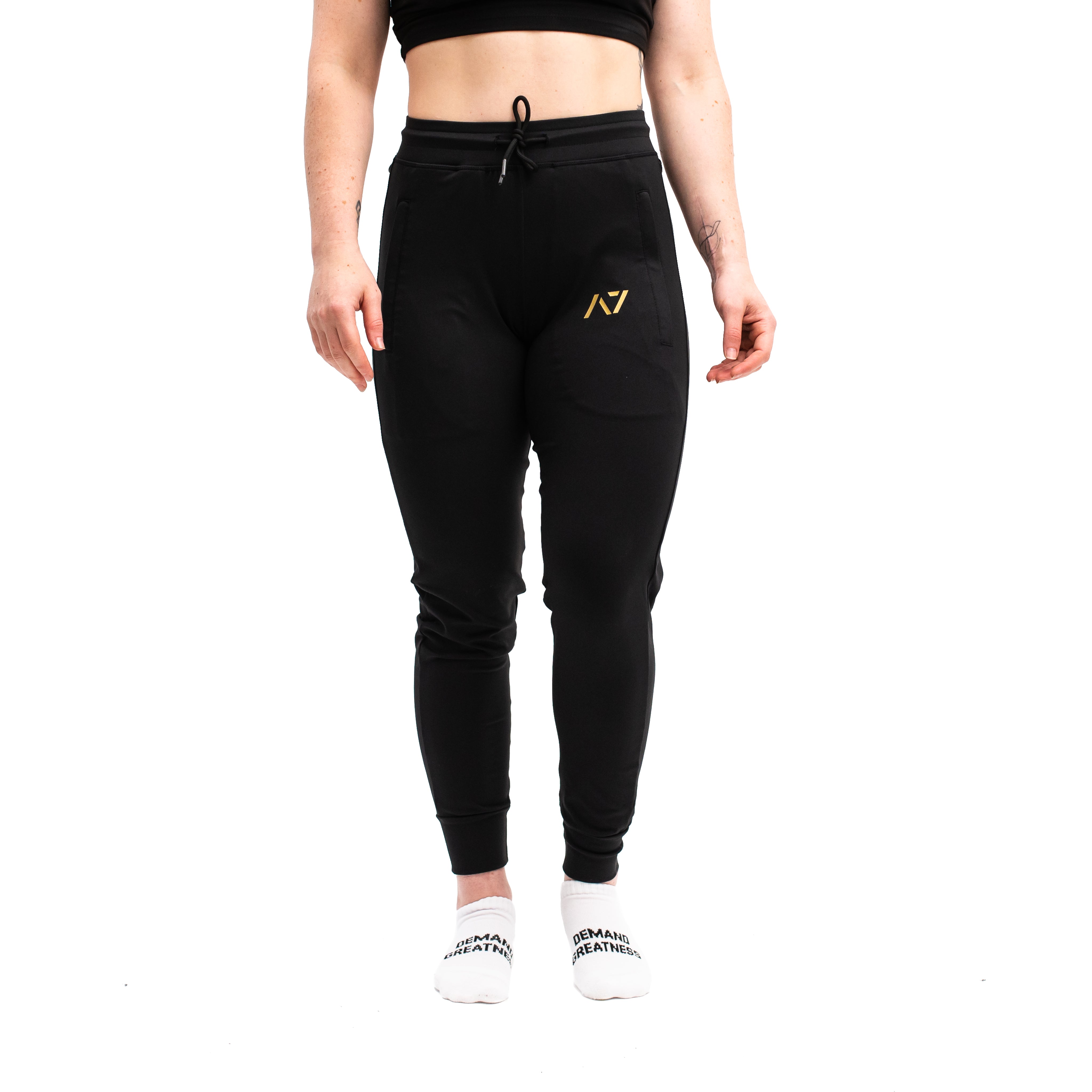 Gold Standard Defy joggers are just as comfortable in the gym as they are going out. These are made with premium moisture-wicking 4-way-stretch material for greater range of motion. These are a great fit for both men and women and offer deep zippered pockets and tapered leg design. Purchase Gold Standard Defy Joggers from A7 UK shipping to UK or A7 Europe shipping to EU.