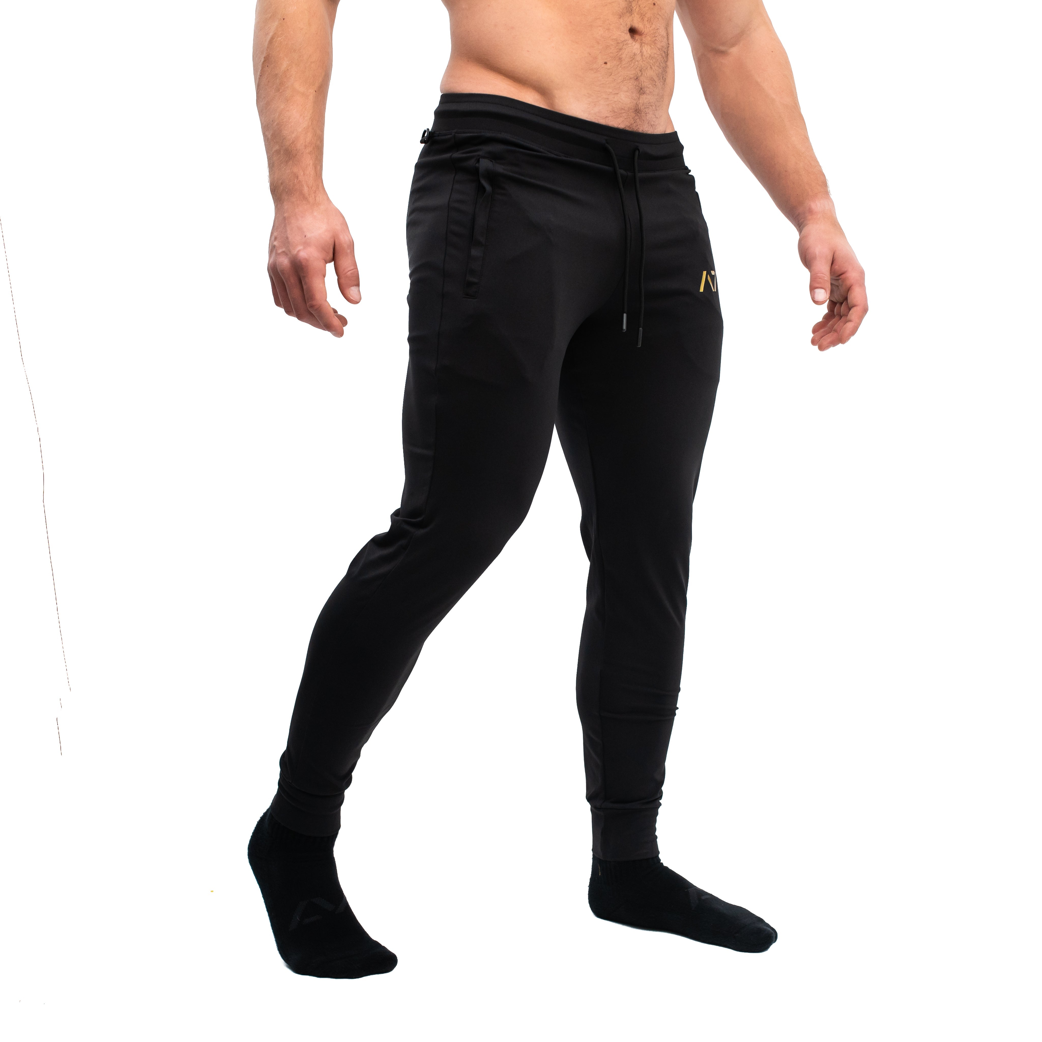 Gold Standard Defy joggers are just as comfortable in the gym as they are going out. These are made with premium moisture-wicking 4-way-stretch material for greater range of motion. These are a great fit for both men and women and offer deep zippered pockets and tapered leg design. Purchase Gold Standard Defy Joggers from A7 UK shipping to UK or A7 Europe shipping to EU.