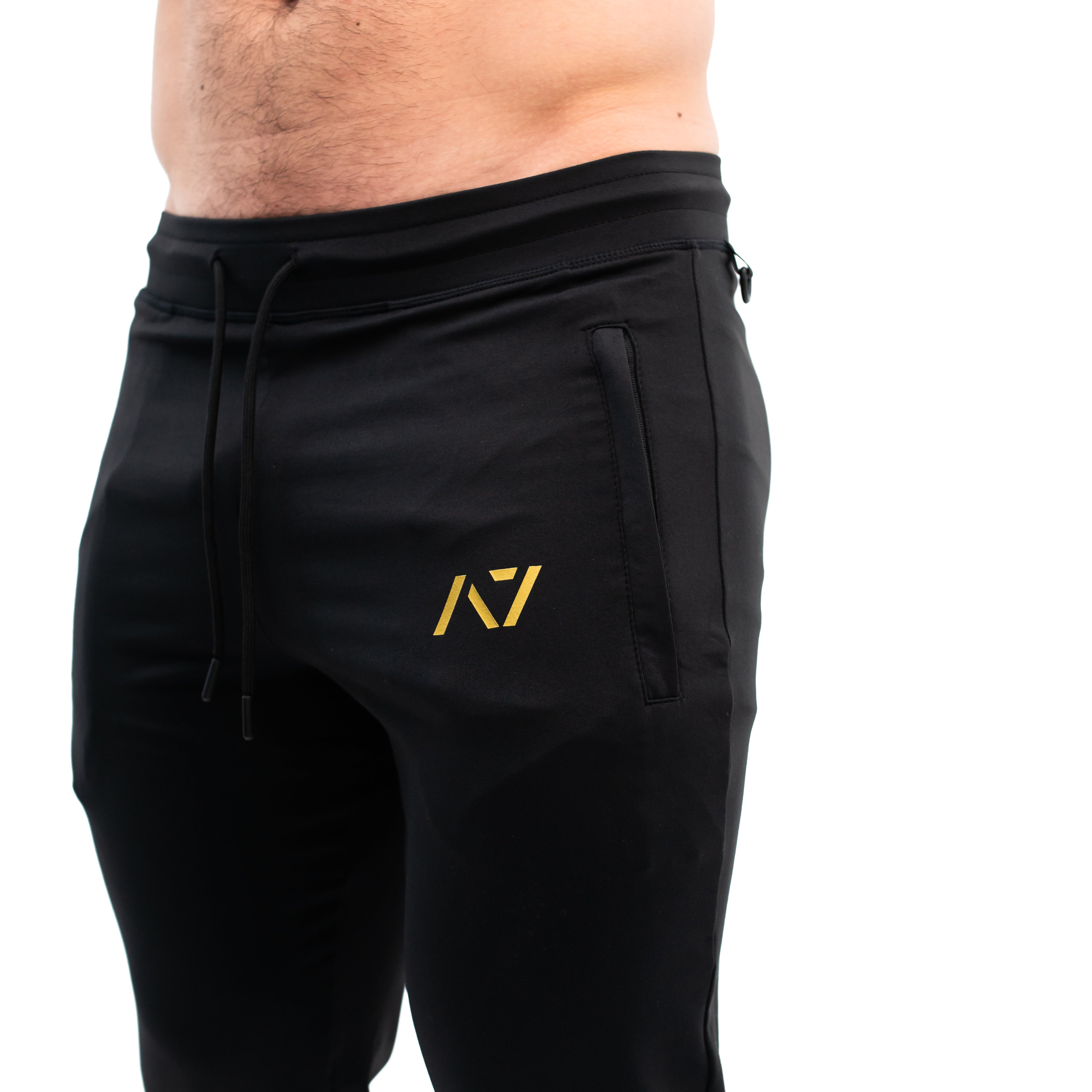 Gold Standard Defy joggers are just as comfortable in the gym as they are going out. These are made with premium moisture-wicking 4-way-stretch material for greater range of motion. These are a great fit for both men and women and offer deep zippered pockets and tapered leg design. Purchase Gold Standard Defy Joggers from A7 UK shipping to UK or A7 Europe shipping to EU.