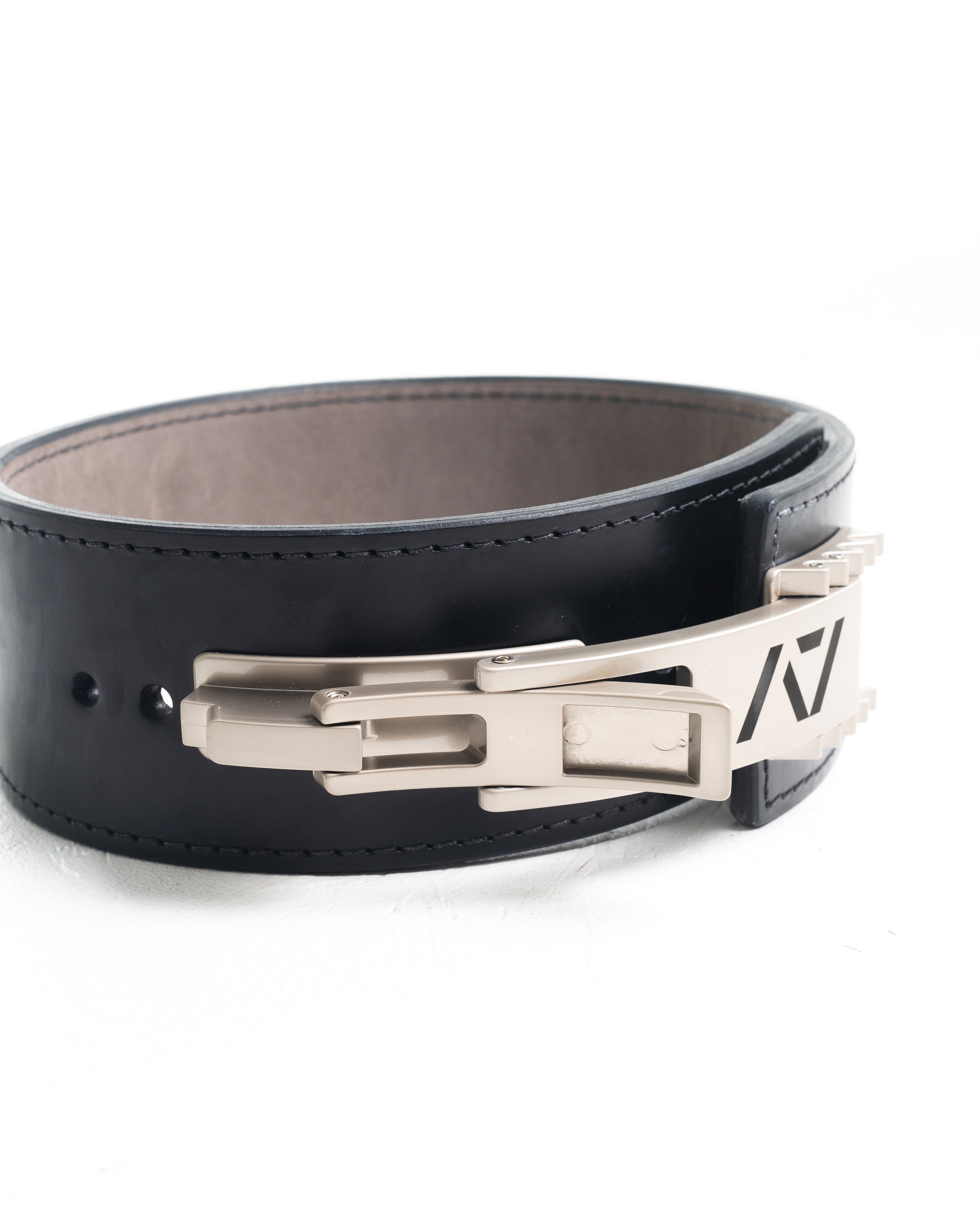 A7 IPF Approved PAL Lever Belt features a black design with black leather, black engraved buckle and debossed A7 logo on the leather. The new Pioneer Adjustable Lever, PAL, buckle allows you to quickly adjust the tightness of your belt for a perfect fit. The IPF Approved Kit includes Singlet, A7 Meet Shirt, A7 Zebra Wrist Wraps, A7 Deadlift Socks, Hourglass Knee Sleeves (Stiff Knee Sleeves and Rigor Mortis Knee Sleeves). All A7 Powerlifting Equipment shipping to UK, Norway, Switzerland and Iceland.