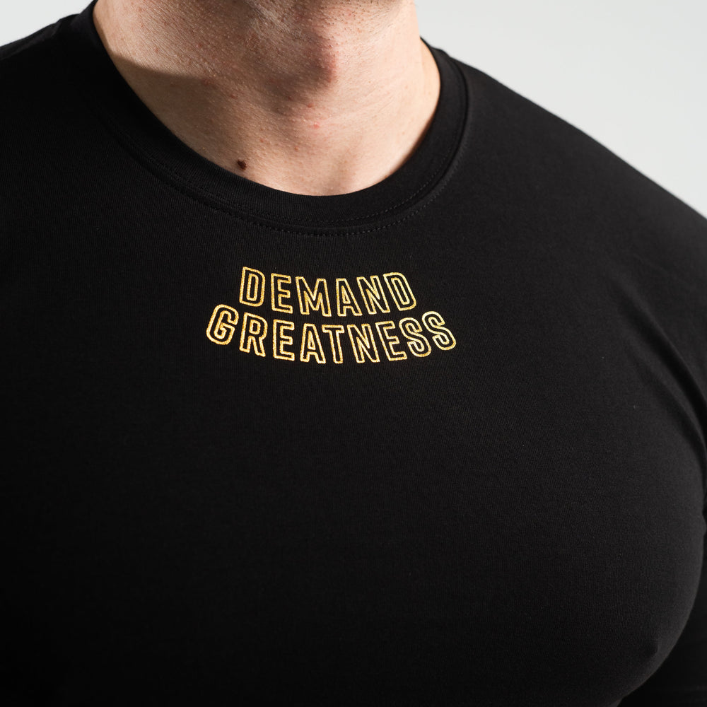 
                      
                        DG23 Gold Standard is our new meet shirt design highlighting Demand Greatness with a double outline font to showcase your impact on the platform. The DG23 Meet Shirt is IPF Approved. Shop the full A7 Powerlifting IPF Approved Equipment collection. The IPF Approved Kit includes Powerlifting Singlet, A7 Meet Shirt, A7 Zebra Wrist Wraps, A7 Deadlift Socks, Hourglass Knee Sleeves (Stiff Knee Sleeves and Rigor Mortis Knee Sleeves). All A7 Powerlifting Equipment shipping to UK, Norway, Switzerland and Iceland. 
                      
                    