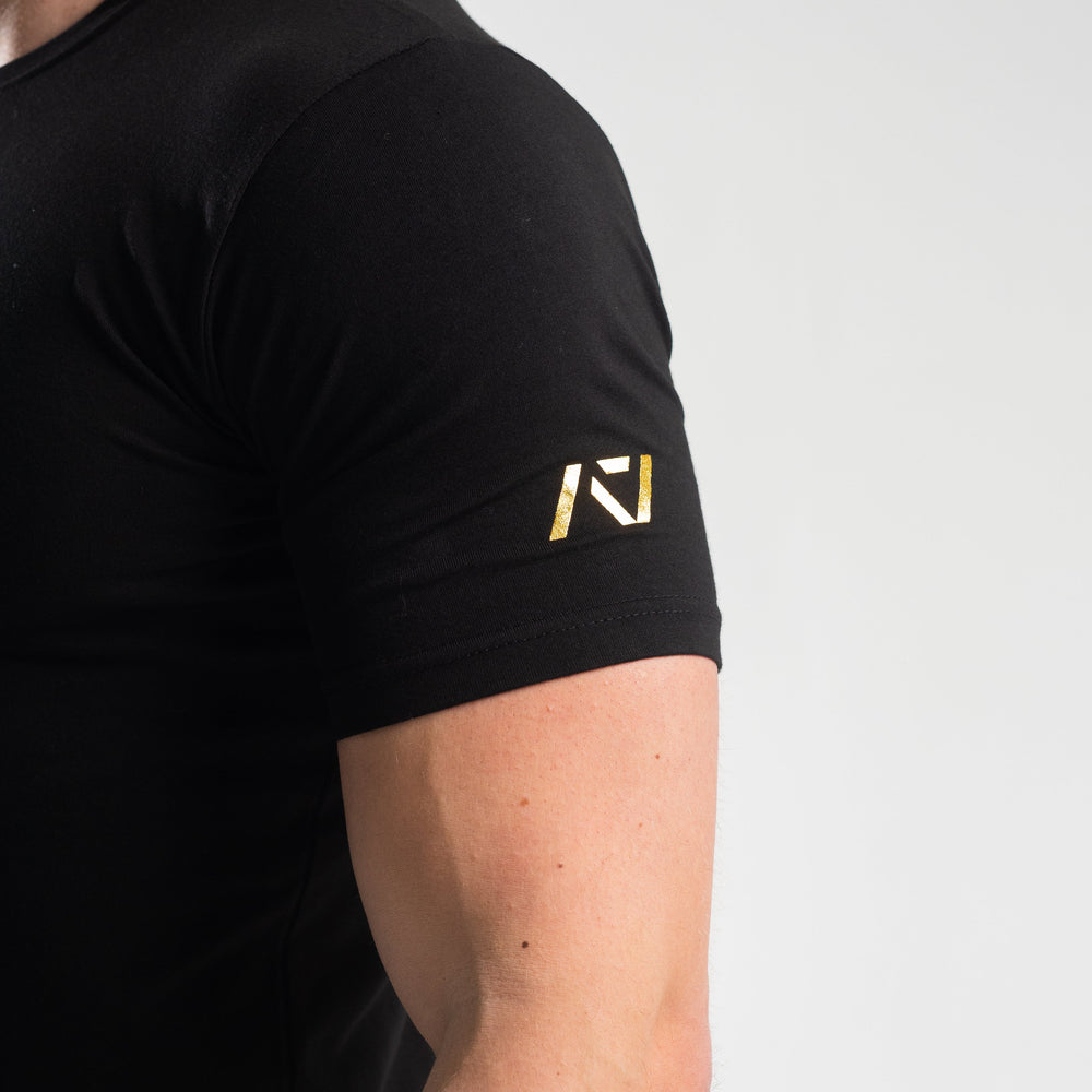 
                      
                        DG23 Gold Standard is our new meet shirt design highlighting Demand Greatness with a double outline font to showcase your impact on the platform. The DG23 Meet Shirt is IPF Approved. Shop the full A7 Powerlifting IPF Approved Equipment collection. The IPF Approved Kit includes Powerlifting Singlet, A7 Meet Shirt, A7 Zebra Wrist Wraps, A7 Deadlift Socks, Hourglass Knee Sleeves (Stiff Knee Sleeves and Rigor Mortis Knee Sleeves). All A7 Powerlifting Equipment shipping to UK, Norway, Switzerland and Iceland. 
                      
                    