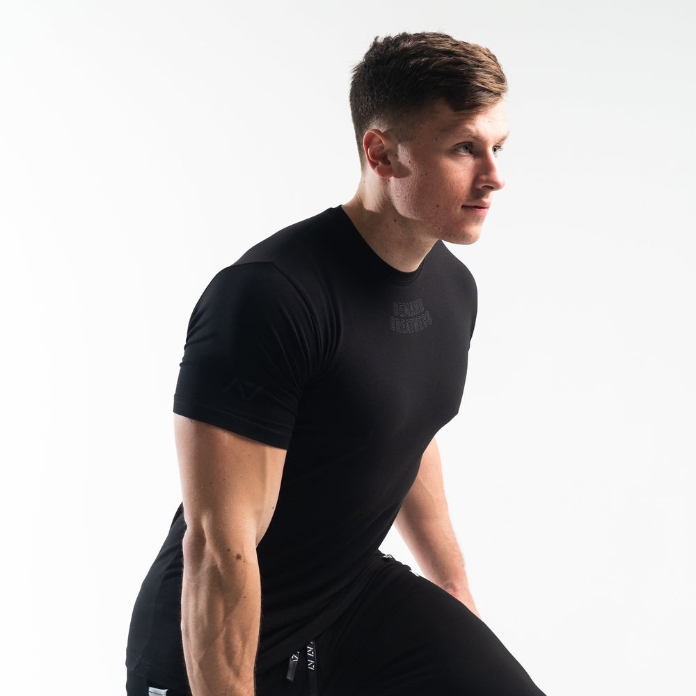 
                      
                        DG23 Domino is our new meet shirt design highlighting Demand Greatness with a double outline font to showcase your impact on the platform. The DG23 Meet Shirt is IPF Approved. Shop the full A7 Powerlifting IPF Approved Equipment collection. The IPF Approved Kit includes Powerlifting Singlet, A7 Meet Shirt, A7 Zebra Wrist Wraps, A7 Deadlift Socks, Hourglass Knee Sleeves (Stiff Knee Sleeves and Rigor Mortis Knee Sleeves). All A7 Powerlifting Equipment shipping to UK, Norway, Switzerland and Iceland.
                      
                    